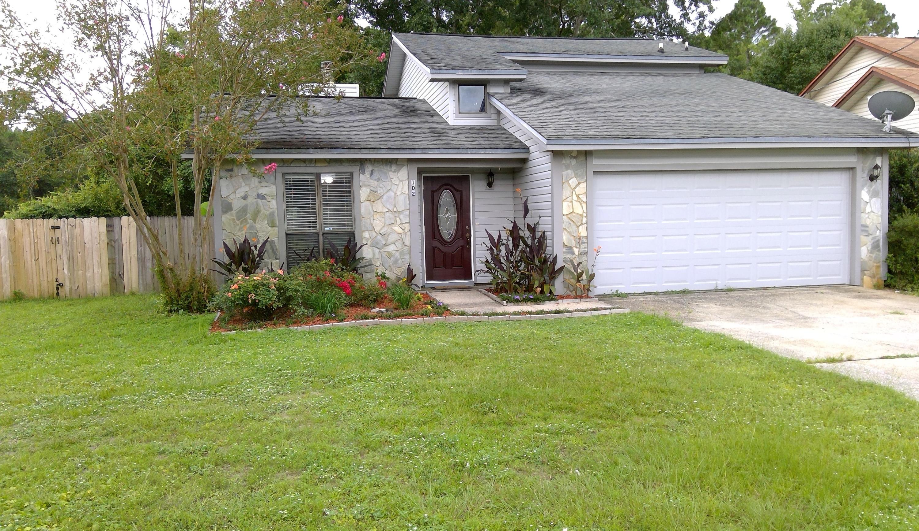 Great three bedroom two 1/2 bath home with a TWO CAR GARAGE located in Crystal Lake Estates!!! New laminate flooring throughout the home with Master bedroom located downstairs. There is a half bath down as well in the hallway off of the living room. The other 2 bedrooms are upstairs with another full bath. Each of these rooms has a balcony overlooking the fenced back yard. Living room has a wood burning fireplace. Kitchen has stainless steel appliances, smooth top range and a new built in microwave. Home has lots of storage space, new insulated garage door, new blinds, fresh paint throughout, new HVAC 2016, new vinyl siding 2012, new back door and a new front door. Schedule your appointment today to see this home before it is gone!