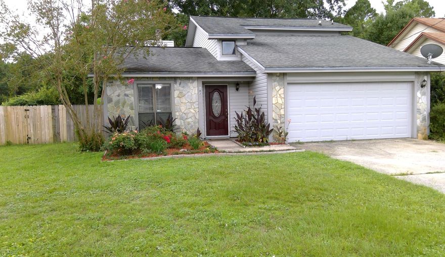 Great three bedroom two 1/2 bath home with a TWO CAR GARAGE located in Crystal Lake Estates!!! New laminate flooring throughout the home with Master bedroom located downstairs. There is a half bath down as well in the hallway off of the living room. The other 2 bedrooms are upstairs with another full bath. Each of these rooms has a balcony overlooking the fenced back yard. Living room has a wood burning fireplace. Kitchen has stainless steel appliances, smooth top range and a new built in microwave. Home has lots of storage space, new insulated garage door, new blinds, fresh paint throughout, new HVAC 2016, new vinyl siding 2012, new back door and a new front door. Schedule your appointment today to see this home before it is gone!