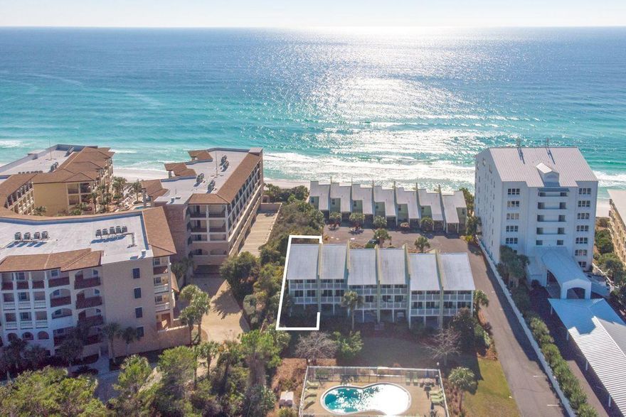 Rarely available, this end unit in Sea Bluff Condo is the perfect beach getaway or investment opportunity. With only one adjoining unit and no ''neighbors'' above or below, this unique property is more townhouse than condo. Ideally located one row back from the Gulf with deeded, gated beach access and a community pool, this Sea Bluff Condo is ready for your signature touches. Existing features include upgraded kitchen cabinetry with granite countertops and center island, tile floors, an attached garage, and a covered patio opening onto the green space and pool area. The master suite features a private balcony overlooking the community pool, plus a walk-in closet and en suite bath. An additional bedroom with en suite bath and a powder bath make for a functional and spacious floor plan.