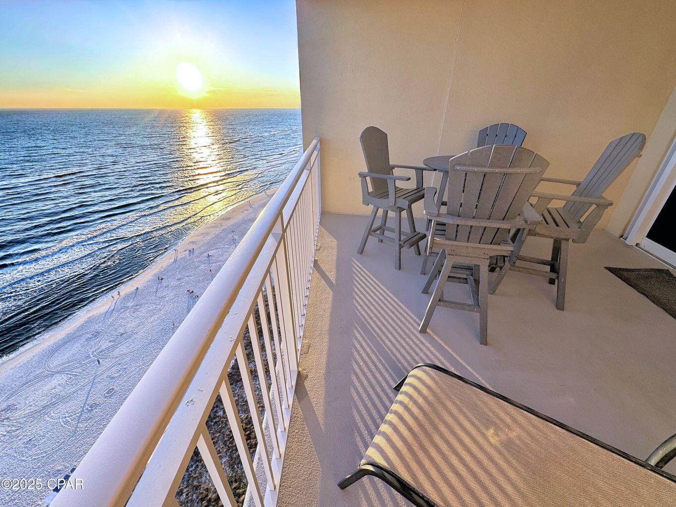 VA Approved! Perched on the 19th floor, this exquisite condo offers breathtaking beach and sunset views, its height making it ideal for observing sea life. The spacious and private balcony, bathed in sunshine, is perfect for naps, meals, and cocktails. This elegant 2-bedroom retreat features the highly sought-after Gulf-front owner's suite with a king bed, walk-in closet, stunning bay windows, and beachfront balcony access. The en-suite bathroom boasts a double vanity, jacuzzi tub, and walk-in shower. The guest room down the hall includes a queen bed and a fun video game console for the kids, with bunk beds just outside its door. Additional in-room amenities include a guest bathroom, stackable laundry, and a couple of owners' closets for your essentials.