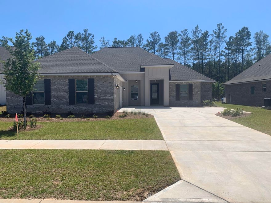 The KLEIN II H in The Trails at Hammock Bay community offers a 4 bedroom, 3 full bathroom, open design. Upgrades added (list attached).Special Features: double vanity, garden tub, separate custom tiled shower, and walk-in closet in master bath, master closet goes through to laundry, double vanity in 2nd bath, kitchen island, walk-in pantry, boot bench in mud room, covered porch and patio, recessed lighting, side-entry garage, undermount sinks, crown molding, bronze plumbing fixtures, framed mirrors, smoke and carbon monoxide detectors, landscaping, architectural 30-year shingles, flood lights, and more!Energy Efficient Features: a tankless gas water heater, a kitchen appliance package with a gas range, vinyl low E MI windows, and more!