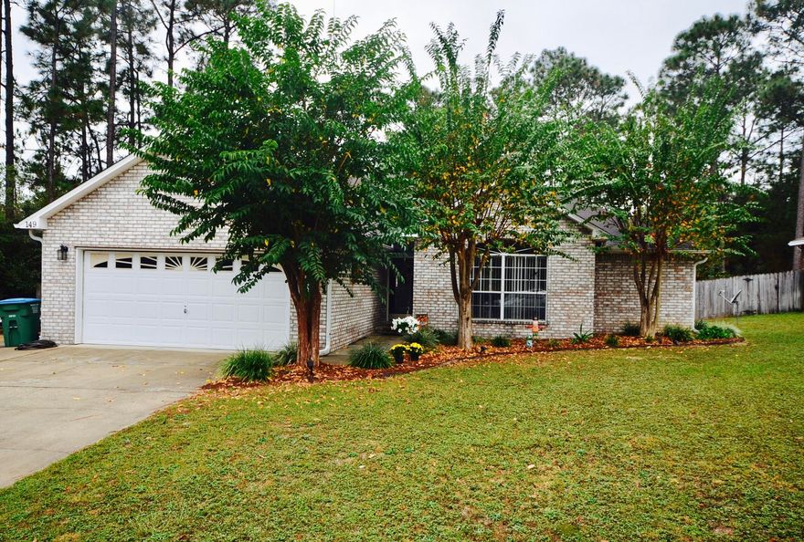 Beautifully maintained, one owner home just behind the hospital and fire station! Convenience is key with this listing. All flooring replaced so no worry about carpet. Quick and easy to clean laminate and tile throughout. Large living room with gas fireplace, formal dining room, half bath all perfect for entertaining. Kitchen recently remodeled and all stainless appliances- gas stove! Breakfast bar and eat in area in the kitchen as well. Screened sitting room on the back and then a large deck and yard building with power as well! Split floor plan with huge master bedroom suite. Large soaking tub and separate shower. Have extra vehicles? They've got you covered there too with a large extended driveway. This home is move in ready!