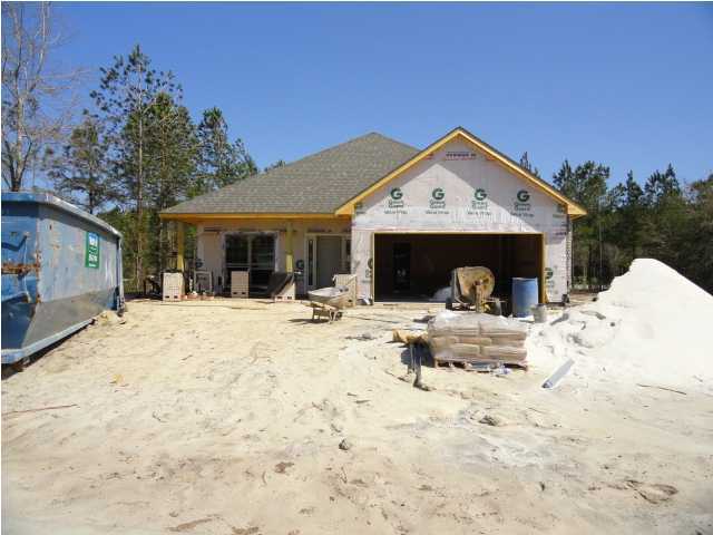 New Construction located in the Passages Neighborhood at Hammock Bay! This Home features a Front and a Covered Back Porch. Granite Counter tops in Kitchen and Baths, Kitchen Island with Granite. Upgraded Tile in Foyer and wet areas. Home comes with a Double Front Entry Garage on corner Home Site. Low maintenance 3 sided Full Brick with Front Hardi Exterior Accents and Board and Batten decorative Shutter. 9' ceilings, GE Stainless Appliances, Irrigation System with well. HOA dues include Basic Cable each month. With HOA includes Amenities and Mandatory Basic Cable