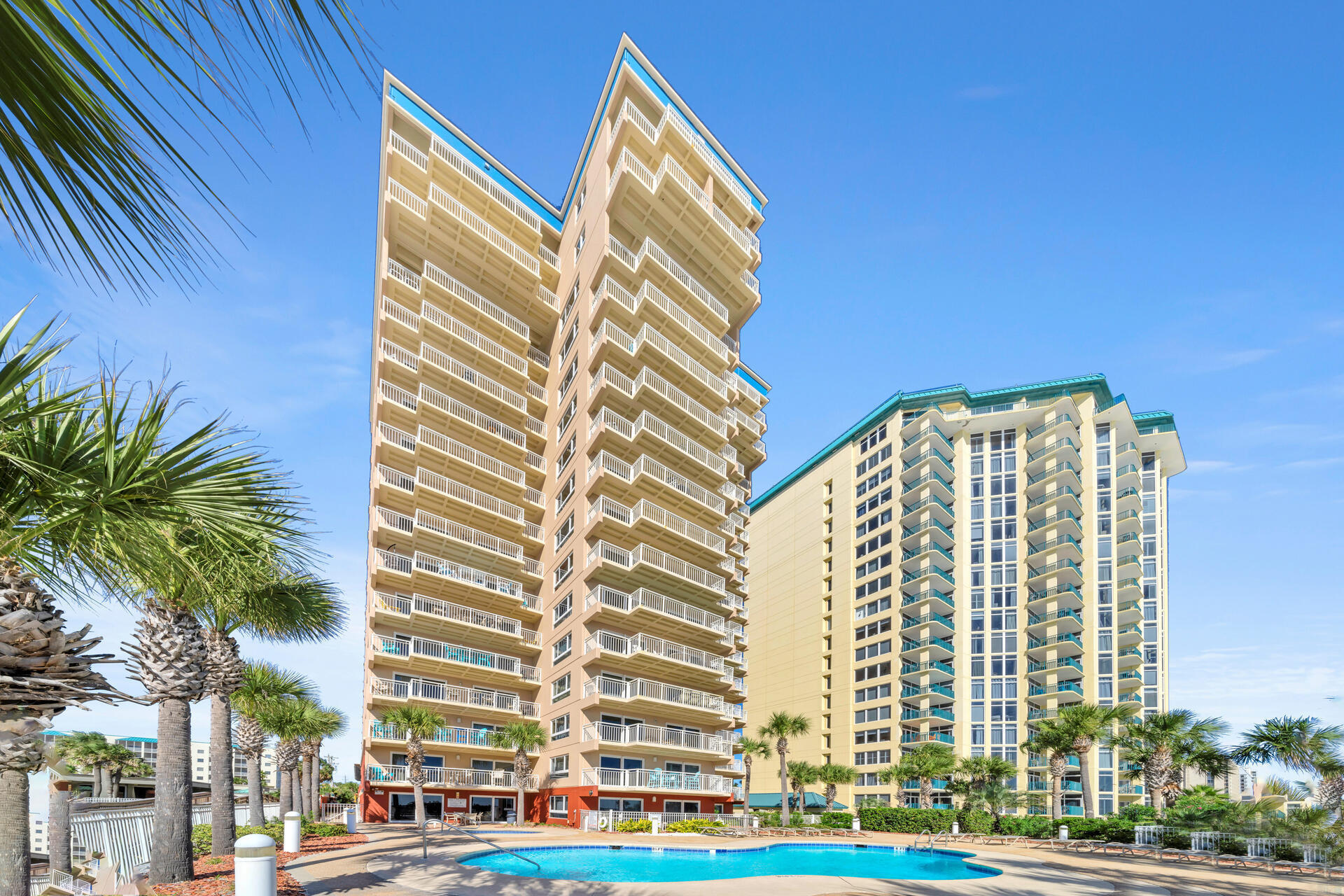 Move on UP to the East Side! Immaculate 4th Fl Destin Towers east end corner condo! Located in the heart of downtown Destin on the Gulf of America! Superb views of sugar white sands, emerald green waters & tropical palms! Enjoy a larger than average unit with foyer entry leading to large updated kitchen with cozy breakfast area and bonus windows. Split plan offers GBR w/2 double beds w/full bath. Separate laundry room. Foyer closet w 2025 hot water heater and 9/2023 A/C. Tile floor leads to large living area with 3 large east facing picture windows with flowing natural light and sliding glass doors facing south. You'll appreciate the updates with new LR drapery, new lamps, tables, & art. Gulffront MBR with doors to oversized balcony w/polyvinyl furn. Huge Mbath with upgraded lg. walk-in shower and granite countertops. Roomy and comfy. Decorated in soft pastel coastal colors. Privacy is key at Destin Towers; Gated coded entry to parking; designated private #41 parking space, coded building entry, low density only 3 units per floor. Property offers seasonally heated pool, hot tub, boardwalk, community room, barbecue grill area, tennis courts and storage. A Destin landmark rising 16 stories is across from Big Kahuna, next to Dunkin donuts and all the many activities that make Destin a family vacation favorite! Superior rental history $67-75K annually. Make 41 Destin Towers your beach dream come true!