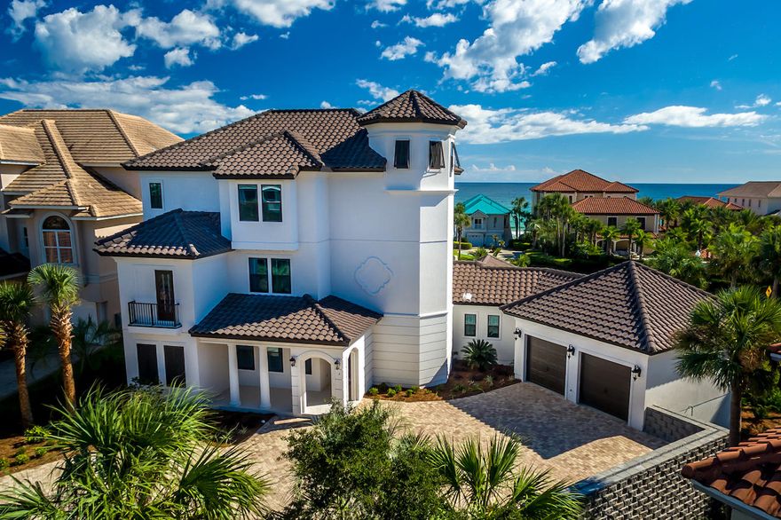 Deeded beach access is located less than twenty steps from this fabulous newly constructed beach home's front gate. Short term seller financing available on this home. You can't get any closer to gulf front living, without a gulf front price than 2 St. Bart's Bay in Destiny East. Positioned perfectly on a wide corner lot, this home provides over 130' of frontage toward the gulf. Corridor gulf views will remain after completion of the gulf front home across the street. A full sized entertainment heated pool, spacious hot tub, and extensive hardscape provide a cool retreat from the sugar white beach. With nearly 5400 square feet of heated and cooled space in three stories plus a two-car garage, this southern influenced transitional style home is both an owner's dream and a rental mac The lucky owner of this fine home will enjoy more than $210,000 in 2017 rental income. Eight spacious bedrooms, all with private baths, a private office, multiple living spaces and an open chef's kitchen ensure enough space and privacy for large gatherings. The soft colored, professional decor, included in the sale, is beach chic and stylish yet relaxing. Painted cabinetry accentuates quartz counters and hardwood floors. An elevator is included for ease of access to all three floors. Destiny East is a prestigious, gated community in East Destin and includes a community swimming pool, an expansive workout facility, a children's playground, community clubhouse with movie theater, two tennis courts, grilling area, nighttime security and a full time facility director to plan events for residents. Please call for your private showing.