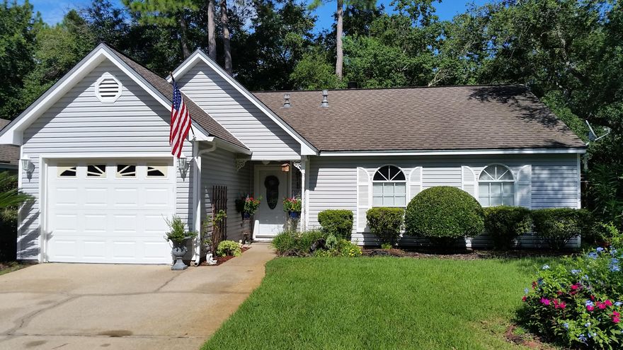 Fantastic home just minutes to Hurlburt Field and Eglin AFB and a short drive to the beach. Pride of ownership really shows in this beautiful home in a great location with a neighborhood pool. The rear garden is a nature lover's dream and is a Certified Wildlife Habitat. Spacious living room with cathedral ceiling and skylight opens to dining area and kitchen. The updated kitchen features granite counters and pretty tile backsplash. New dishwasher in 2017, HVAC system in 2011 and roof about 2005. Home offers gas stove, heat and hot water heater. Large master bedroom has cathedral ceiling and bay window. Tile flooring in foyer, kitchen and baths with laminate wood in living areas and bedrooms, good for people with allergies. If you are looking for peace and tranquility, this is it!