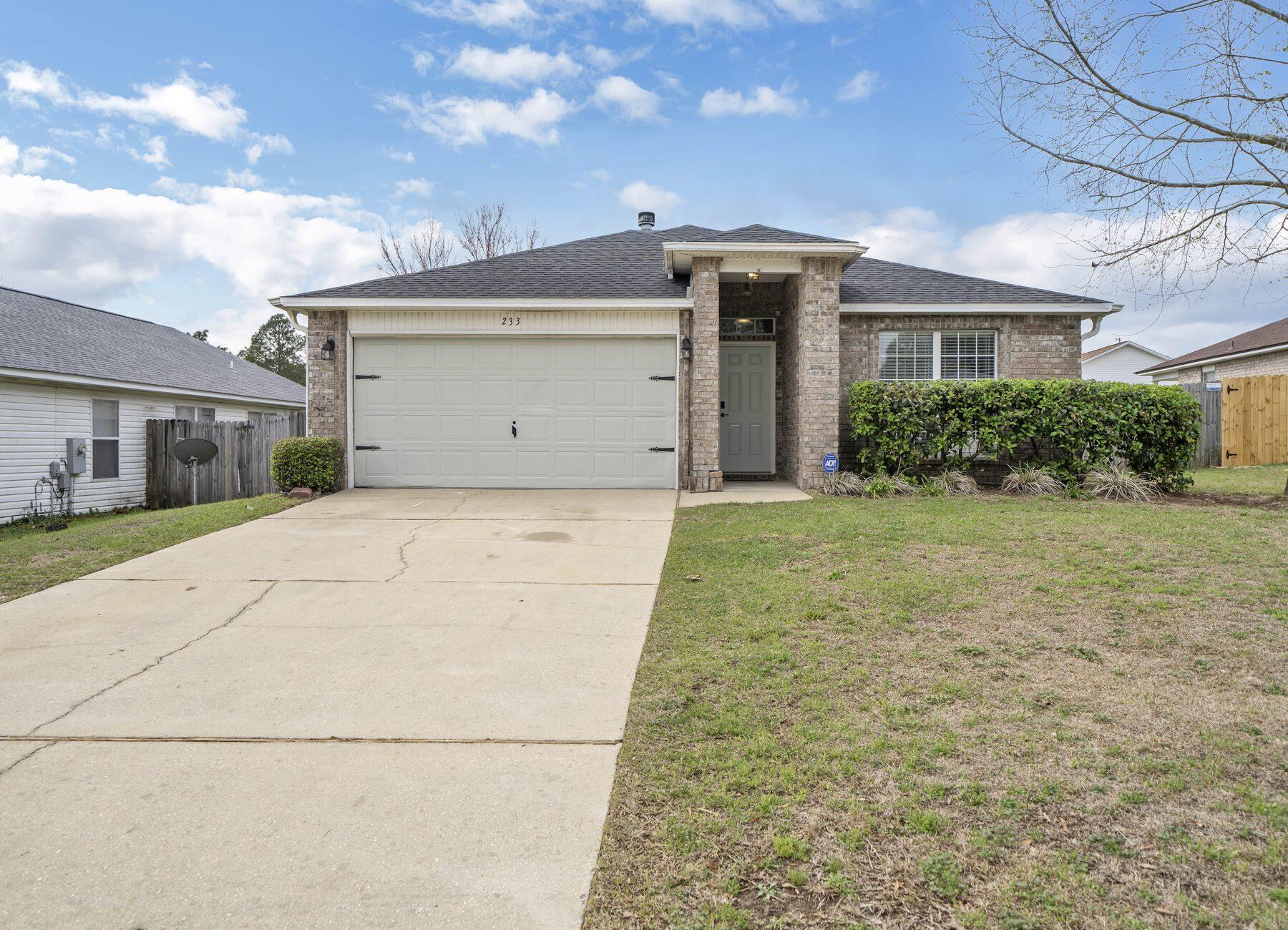 Wonderful home in South Crestview! This home has been updated and has a great open floorpan concept that is perfect for entertaining. The kitchen has beautiful butcher block countertops, with a large island, tile flooring, large pantry, and stainless steel appliances The floors have been updated in the bedrooms and master bath. The living room is a great size with brand new carpet! Both bathrooms have upgraded vanities and tile in the guest bathroom. Relax outside on the covered back porch or quaint sitting area in the backyard. The outdoor space is the perfect setting for barbecues and entertainment! Home has solar panels and new roof in 2021. Call today to schedule your private showing!