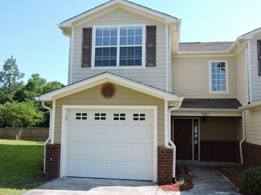 Available 5/27 - 3 bedroom 2.5 bath End unit townhouse in Eagle's Landing subdivision that has a POOL and is located south of I-10. Easy commute to all bases, beaches and shopping. This well developed community consists of a nature preservation area with nature trails, a gazebo, a large community pool, clubhouse, sidewalks, and underground utilities. The interior has been freshly painted in neutral colors; dining and living room have just been tiled with a wood grain tile. The entryway, kitchen, and all bathrooms have low-maintenance tile floors. Crown molding adds a touch of elegance. This unit includes a dishwasher, microwave, stove and a new side by side refrigerator with icemaker. The pass-through from the kitchen to the living room makes entertaining easy. The new French doors lead to nice sized patio.   The Master suite has a nice walk-in closet, spacious bath and good sized bedroom.  Call for an appointment, we will show on weekends.