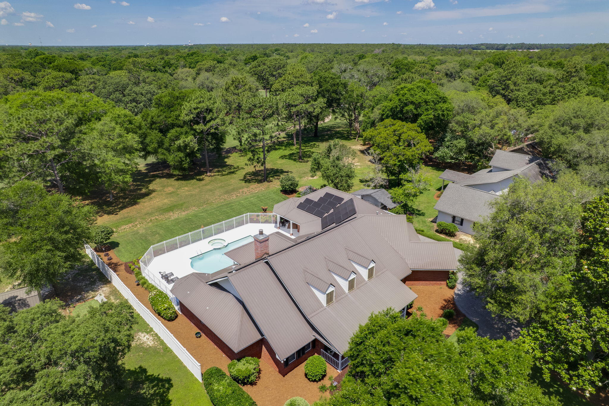**Stunning Home on Rocky Bayou Golf Course - Your Private Oasis Awaits!**Welcome to 1129 Forest Road, a spectacular residence nestled on the serene landscape of the Rocky Bayou Golf Course, offering unparalleled luxury and comfort. This magnificent 3-bedroom, 3.5-bathroom house boasts over 4,000 sq. ft. of heated and cooled space designed for both relaxation and entertainment. Step into your dream home through the elegantly designed entrance with custom cut glass wood Entry doors and be captivated by the airy, sunlit spaces created by Anderson windows and doors throughout. The Formal living area features a Coffered Celing and floor to ceiling windows, gas fireplace, providing warmth and ambiance for cozy evenings spent with family and friends. **Gourmet Kitchen & Dining:**
The heart of this home is undoubtedly the gourmet kitchen, equipped with Kitchen Aid appliances, a Sub Zero refrigerator, 5 Burner gas cooktop, dual ovens, and Wet Bar with ice maker. Perfect for entertaining, the kitchen flows seamlessly into the formal dining room, where gourmet meals can be enjoyed.
**Outdoor Paradise:**
Step outside to your private outdoor oasis, complete with a heated pool and luxurious jacuzzi, perfect for unwinding after a long day. Host unforgettable summer barbecues using the built-in outdoor gas grill, and enjoy the convenience of an irrigation system on well to keep your landscaping lush and inviting.
**Unmatched Comfort & Security:**
This home is designed with comfort in mind, featuring a 5-zone HVAC system by TRANE to ensure a perfect climate year-round. With additional perks like a tankless water heater, a whole house water filter, and a transferable termite bond, you can enjoy peace of mind in your new sanctuary.
**Additional Features:**
" 10k Gas Generator
" 45 Solar Panels-American Made in Georgia
" House/Lot located on Rocky Bayou Golf Course (#7)
" Heated Pool with Jacuzzi
" Bar w/Ice Maker and Wine Cooler(holds 220 bottles+)
" Metal Roof
" Anderson Windows and Doors
" 3 Car Garage
" Heated and Cooled Storage room in Attic
" 5 Zone HVAC(TRANE)
" Security System with 4 Cameras
" Kitchen Aid Appliances plus Sub Zero Refrigerator
" Tankless Water Heater
" Dual Ovens
" Two Gas Fireplaces
" 3M Coating on Windows
" Pool Table-Custom
" Large Primary Closet
" Underground Safe
" Built-in Outdoor Gas Grill
" Irrigation System on Well
" Whole House Water Filter
" Six Ft. Closet in Garage
" Jacuzzi Bath Tub in Master
" Termite Bond Transferrable
" Carpet Concession with Acceptable Offer
" New Pool Fence with 10 yr Warranty
" Brick Paver Driveway, Sidewalks & Patio
- A spacious primary suite offers a large walk-in closet, Fireplace and a luxurious jacuzzi bath, creating a true retreat within your home.
- The attic includes a heated and cooled storage room, providing ample space for your belongings.
- Entertain effortlessly with a custom pool table and Wet Bar with Ice Maker Wine Cooler that accommodates over 220 bottles of wine.
- The property is complete with a new pool fence that comes with a 10-year warranty, ensuring safety for your family and guests.
-Close Proximity to Publix/Wal-Mart Shopping.
-Open view to Holes 6 &7 on RBCC golf course
**Extras Galore:**
With a 3-car garage equipped with a 6 ft. closet for additional storage, a metal roof for durability, 45 solar panels for energy efficiency, and a comprehensive security system with four cameras, this home combines luxury living with practicality.
Don't miss the opportunity to own this incredible property that offers not only a home but a lifestyle. Schedule your private tour today and experience firsthand the grandeur and comfort of 1129 Forest Road, where every detail has been perfectly crafted for you!
**Your dream home awaits - act now!**