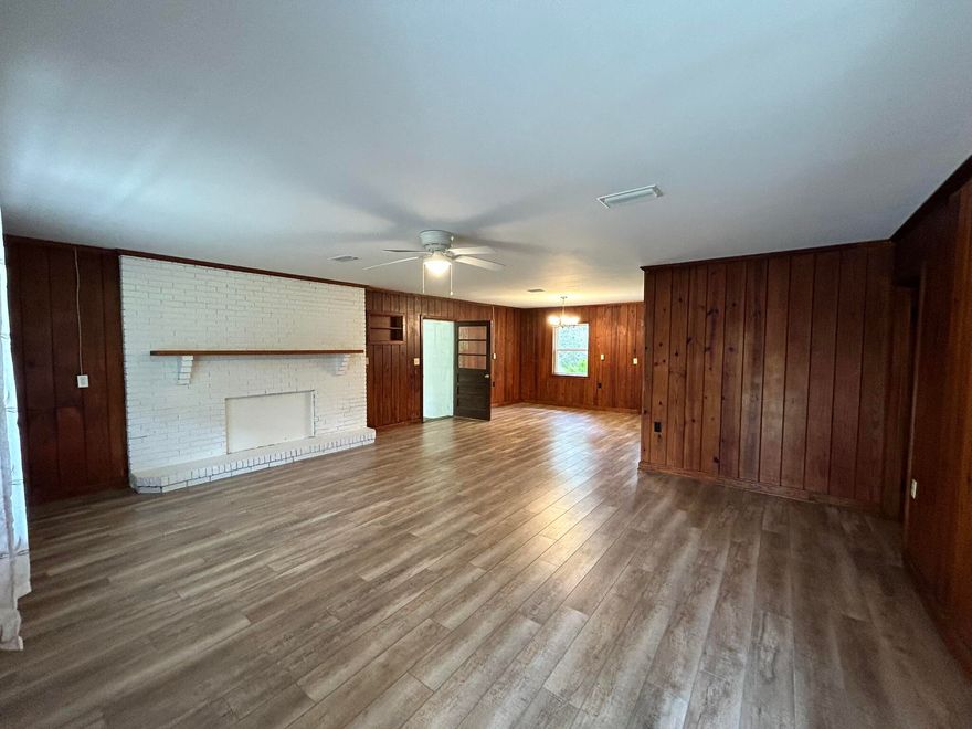 Country living but close to shopping and schools. Vinyl plank flooring throughout. Large living space perfect for your plans!note: half bath in laundry room off carport.Please call office and ask for Richie for showing instructions.
