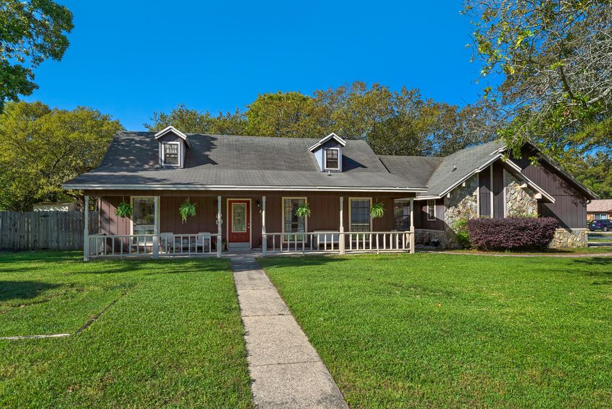 Come home to your backyard paradise complete with pavers and custom bar with faux fireplace. Perfect for entertaining! This beautiful home sits on a corner lot in Bluewater Bay with a spacious welcoming front porch. Interior features crown molding, wood laminate and tile flooring, vaulted ceiling and wood-burning fireplace in living area, kitchen has been upgraded with stainless steel appliances, new granite countertops, backsplash, cabinets and eat-in area. Roomy master bedroom with double vanity in the bathroom and separate closet. Separate laundry and garage has extra storage plus extra parking space for boat or RV. Room to add a pool. Enjoy the amenities of Bluewater Bay with pool membership, tennis, golf, restaurants and marina. Close to Eglin and the beaches
