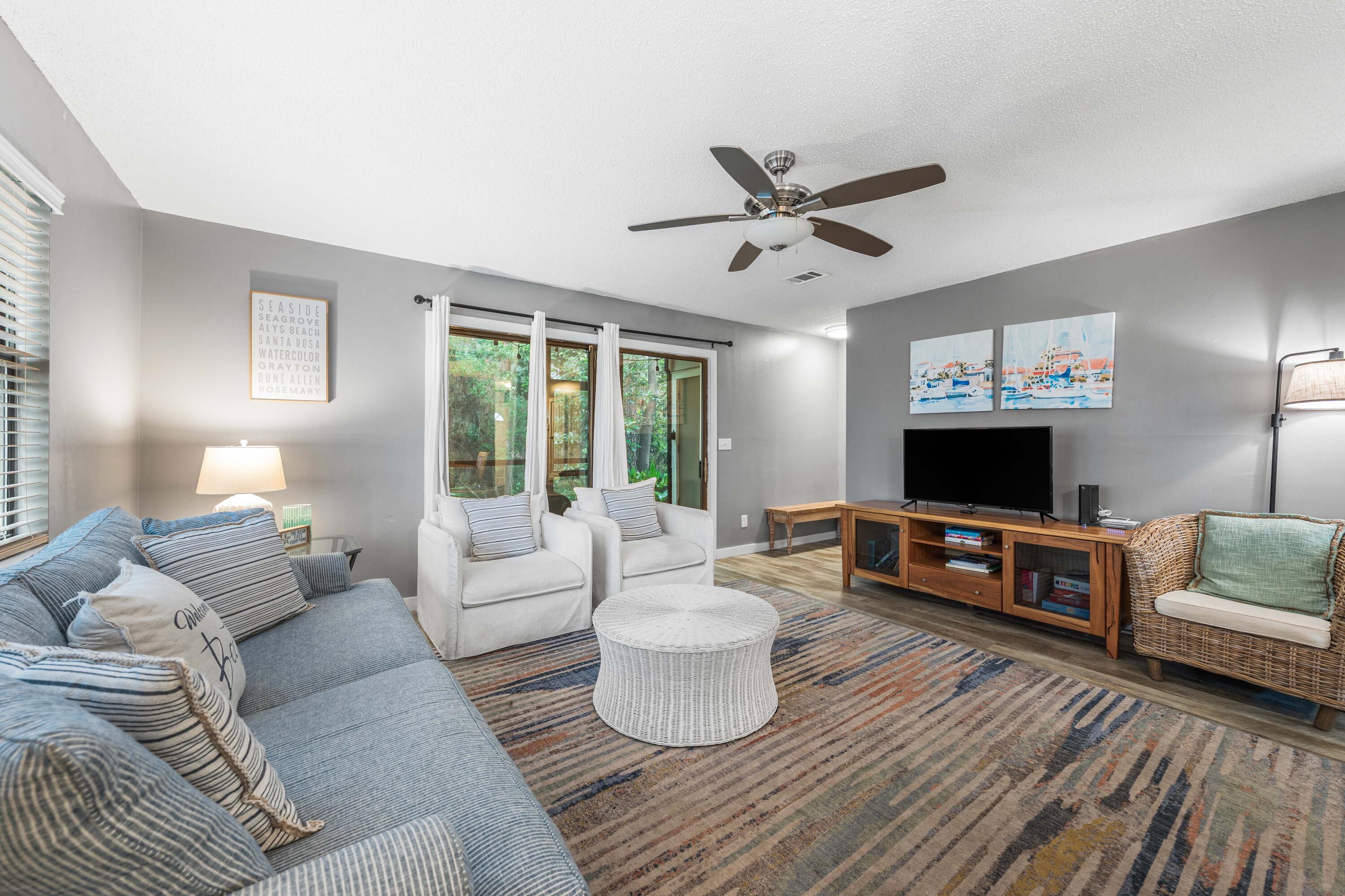 Tucked within the lush, coastal setting of Cassine Gardens, this 2BR/2.5BA corner townhome offers a sought-after Seagrove Beach location just steps from the Gulf. Overlooking the peaceful expanse of the neighboring Point Washington State Forest and surrounded by outstanding community amenities, this property blends comfort, style, and convenience. The kitchen features granite countertops, a tile backsplash, and ample cabinet storage, opening to a spacious living and dining area ideal for relaxing or entertaining. Wood flooring throughout the main living spaces adds warmth and coastal character. Recent enhancements include a new water heater, furnace and exterior painting. The main level opens to a screened porch with tranquil forest views -- the perfect spot for morning coffee or evening unwinding. Upstairs, two private en-suite bedrooms include a guest suite with built-in bunks and a queen bed, and a forest-facing primary suite with a screened porch, oversized closet, and private bath. Thoughtfully designed for ease of living, this home is the perfect low-maintenance beach escape.
Cassine Gardens residents enjoy outstanding amenities including two pools, tennis courts, and scenic walking trails through the Point Washington State Forest. With beach access, dining, and shopping all within walking distance, this property delivers the perfect combination of coastal lifestyle and move-in-ready comfort.