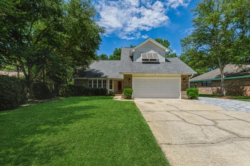 Beautiful home located in desirable Bluewater Bay community, minutes from Destin and a convenient location to area military bases. Home features 3 bedrooms with formal dining room, Florida room, and second story loft area. Kitchen boasts tons of cabinet and counterspace, with stainless steel appliances and island with gas range. Master bedroom is located on the main floor, masterbath has double vanities, garden tub, and separate shower. Large privacy fenced backyard and an extra parking pad upfront and on the side with a double gate for boat parking. Roof is 2017.