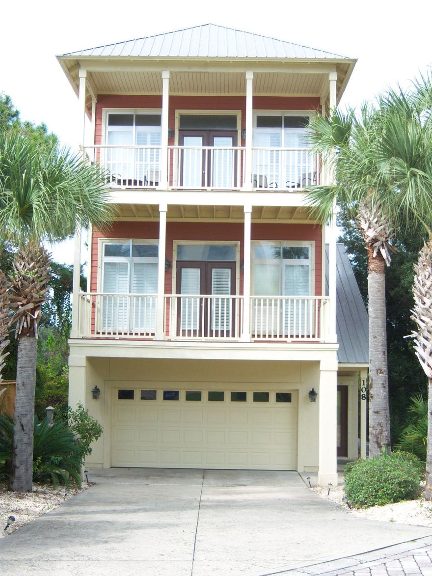 Location, Location, Location!This 3BR-3BA-2 car garage second home has 320 sq. ft. of covered porches. Gulf view & Lake view. Open arrangement of kitchen, dining room and great room. 10' ceilings. Wood floors in living area, stairs & hallways. Tile on floor and countertops in kitchen & bathrooms. Carpet in Bedrooms. Bonus Room in garage. Small neighborhood with pool located within walking distance of beach access #66.