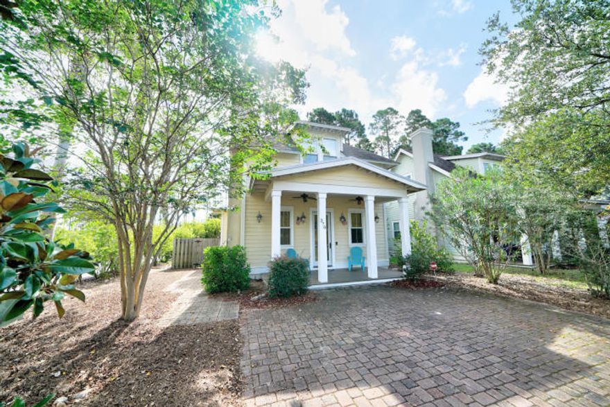 Stunning furnished Florida Cottage home in Harrison's Walk. Location at it's best within 1/2 mile to the sandy white beaches as well as sits across from community pool. Beautifully decorated to truly enjoy the comforts of home. Spacious floor plan with master on 1st floor and two large bedrooms up stairs. This cottage boasts with character from the moment you walk in the front door. Don't miss out on this ready to go vacation home that has room for the entire family. The bedrooms upstairs are furnished with two queen beds in each room.
