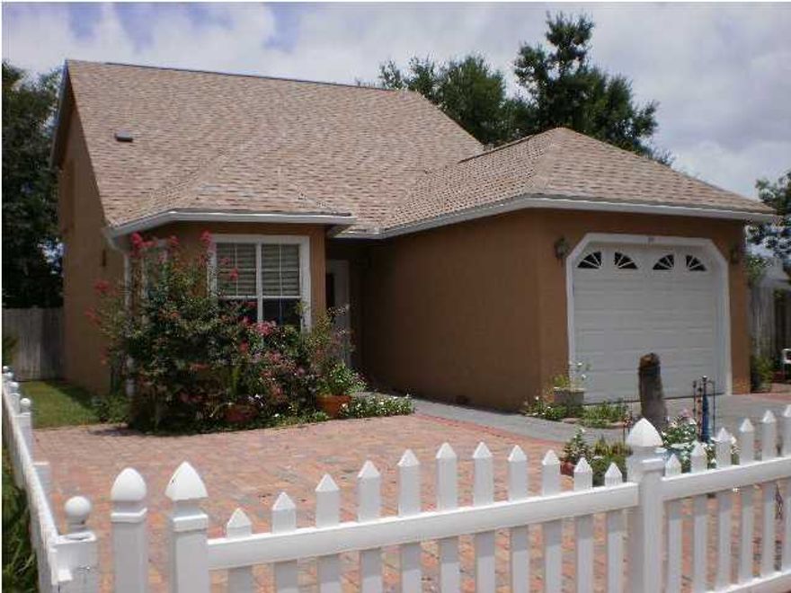 This house is a steal at $189,500! At only $130 per square foot, this is the best priced home in Destin. With a paint brush, a few improvements & some TLC and you'll have a l Great family neighborhood close to everything. Open floor plan with vaulted ceilings. Master Suite on 1st floor. Upstairs, there are 2 bedrooms, a full bath with skylight, plus a loft area for office or game room. Tile through out the 1st floor. French doors lead to a very private fenced backyard. Bay window in kitchen. The one car garage. Front yard is easy to maintain with cobblestone pavers. The home appears to be in good condition. Great opportunity in the heart of Destin for under $200,000! NO HOA Fees AS IS.