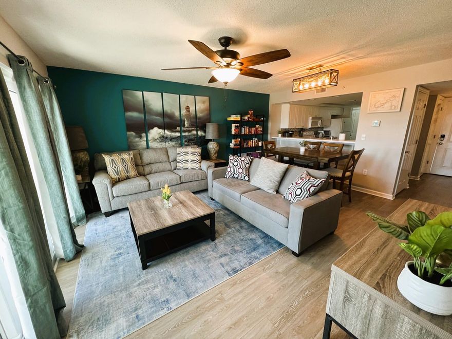 2-bedroom, 2-bath condo boasting captivating Gulf and Sound views! Unit 613 received transformation with new flooring and updated furnishings in 2019. Special assessment has been paid IN FULL! A great investment opportunity with an impressive track record generating $71,000 in 2023, $74,000 in 2022, and $65,000 in 2021 (totals from January to September only) Building allows for self-management and is VA approved! Notable features of the unit - in-unit laundry equipped with a new washer and dryer, a private balcony, an assigned covered parking spot, and access to an array of amenities including a community pool, fitness center, and direct walkway to a public beach access.