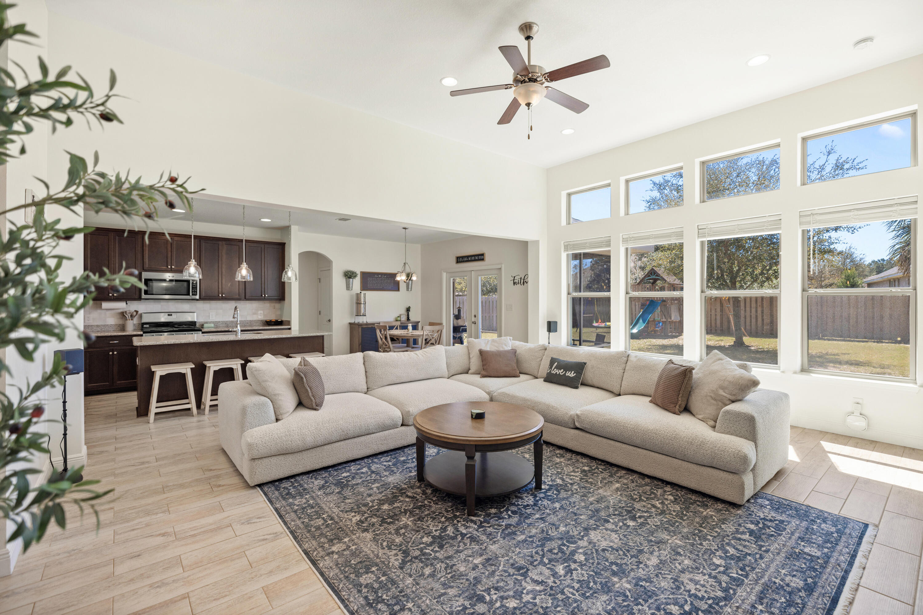 Stunning home in the Brighton neighborhood of amenity-rich Hammock Bay. Spread out in this beautiful home with a sprawling 2,625 SQ FT of comfortable living space, HIGH CEILINGS, and many windows to bathe the home in NATURAL LIGHT. The 4 BEDROOM and 3 FULL BATHS are set in a 3-WAY SPLIT FLOOR PLAN offering enhanced privacy and quiet with one bedroom and full bath tucked away in a separate hall as a haven for guests. The OFFICE WITH CLOSET provides an appealing and productive work environment and could double as a 5th bedroom. The OPEN-CONCEPT GREAT-ROOM seamlessly integrates the kitchen, CASUAL DINING, and living areas, creating a welcoming space for family gatherings and relaxation. There's also a FORMAL DINING room for hosting elegant dinners and celebrations. The spacious kitchen features an abundance of counter space and has a LARGE ISLAND, real WOOD CABINETS, STAINLESS STEEL appliances and a BREAKFAST BAR. The primary suite has classy BOARD & BATTEN WALLS, a TRAY CEILING, WALK-IN CLOSET, and a GARDEN TUB, STEP-IN SHOWER, and vanity with DOUBLE SINKS in the primary bathroom. WOOD LOOK TILE THROUGHOUT the house provides a sleek and stylish ambiance and there's NO CARPET!
Other features include an attached two-car garage, laundry room, FRENCH DOORS, gutters, and a PRIVATE MAILBOX conveniently found right out the front door. Climate-controlled with central heat and air, the home boasts a robust infrastructure with underground utilities, a gas range, gas heating, and gas water heater yielding very ECONOMICAL UTILITY BILLS.
All of this nestled on an OVERSIZED LOT OF 1/3 ACRE, the backyard is completely FENCED and there are both front and back PORCHES making it perfect for entertaining and outdoor enjoyment & large enough to add a pool.
Located in the beautiful Florida Panhandle, the town of Freeport is between Niceville and Panama City. Boat, fish, swim, explore, and play in the sand in nearby bays, bayous, state parks and miles of beaches on the Gulf of Mexico. Enjoy easy access to Destin, Eglin Air Force Base, Fort Walton Beach, and more.
The popular planned community of Hammock Bay is zoned for Freeport Elementary, Freeport Middle, and Freeport High Schools, all three "A-RATED" SCHOOLS by the Florida Department of Education with small class sizes and above average standardized test scores.
A Community Like No Other---
Living in Hammock Bay is like stepping into a five-star resort that never ends. Residents enjoy:
-Three (3) luxurious resort-style pools, including a lap pool
-A 4,000-square-foot 24-hour Modern fitness center for healthy lifestyle
-Tennis, basketball, and pickle-ball courts
-Two (2) dog parks, complete with a dog-washing station
-An outdoor theater and Town Square hosting concerts, movies, and food trucks
-Miles of scenic walking trails and stocked ponds
-Private Bay Club with a dock, fishing pier, and breathtaking sunsets over Choctawhatchee Bay
Other community mentions are:
Brewery for craft beer enthusiasts. There's an outdoor amphitheater of sorts, a dental office, a food truck court, scheduled events and much more to cater to a variety of interests and needs. There's even a Bi-Monthly Farmer's Market in Town Square. Events galore..such as the massive egg hunt drop from helicopters at Easter, 4th of July, Pumpkin patch in Fall, Christmas Festivities.
With low HOA fees covering these unbeatable amenities, Hammock Bay stands apart from any other community in Florida.
A Location That Has It All
Situated in the thriving town of Freeport, this home offers the perfect balance of seclusion and accessibility. Within minutes, you can explore:
-The stunning 30A beaches
-South Walton's renowned dining and shopping
-Destin's lively entertainment scene
-Eglin and Hurlburt Air Force Bases, major airports, and top-rated schools
Your Next Chapter Begins Here
This isn't just a home -- it's the backdrop for a lifetime of memories. Whether you're enjoying peaceful mornings on the porch, lively neighborhood gatherings, or the luxury of resort-style living, Brighton Cove at Hammock Bay delivers it all.
Don't let this opportunity pass you by--schedule your private tour today and experience the magic of Hammock Bay living!