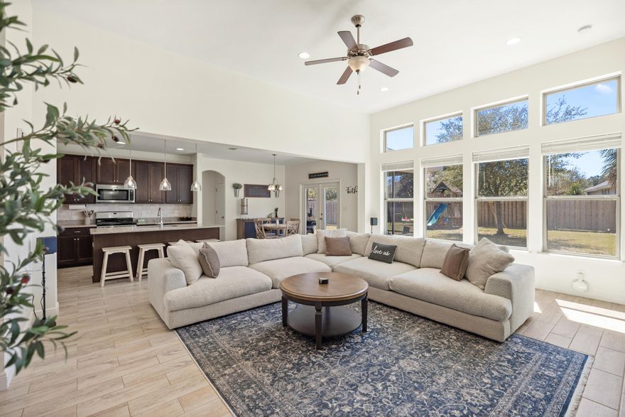 Stunning home in the Brighton neighborhood of amenity-rich Hammock Bay. Spread out in this beautiful home with a sprawling 2,625 SQ FT of comfortable living space, HIGH CEILINGS, and many windows to bathe the home in NATURAL LIGHT. The 4 BEDROOM and 3 FULL BATHS are set in a 3-WAY SPLIT FLOOR PLAN offering enhanced privacy and quiet with one bedroom and full bath tucked away in a separate hall as a haven for guests. The OFFICE WITH CLOSET provides an appealing and productive work environment and could double as a 5th bedroom. The OPEN-CONCEPT GREAT-ROOM seamlessly integrates the kitchen, CASUAL DINING, and living areas, creating a welcoming space for family gatherings and relaxation. There's also a FORMAL DINING room for hosting elegant dinners and celebrations. The spacious kitchen features an abundance of counter space and has a LARGE ISLAND, real WOOD CABINETS, STAINLESS STEEL appliances and a BREAKFAST BAR. The primary suite has classy BOARD & BATTEN WALLS, a TRAY CEILING, WALK-IN CLOSET, and a GARDEN TUB, STEP-IN SHOWER, and vanity with DOUBLE SINKS in the primary bathroom. WOOD LOOK TILE THROUGHOUT the house provides a sleek and stylish ambiance and there's NO CARPET! 

Other features include an attached two-car garage, laundry room, FRENCH DOORS, gutters, and a PRIVATE MAILBOX conveniently found right out the front door. Climate-controlled with central heat and air, the home boasts a robust infrastructure with underground utilities, a gas range, gas heating, and gas water heater yielding very ECONOMICAL UTILITY BILLS. 

All of this nestled on an OVERSIZED LOT OF 1/3 ACRE, the backyard is completely FENCED and there are both front and back PORCHES making it perfect for entertaining and outdoor enjoyment & large enough to add a pool.

Located in the beautiful Florida Panhandle, the town of Freeport is between Niceville and Panama City. Boat, fish, swim, explore, and play in the sand in nearby bays, bayous, state parks and miles of beaches on the Gulf of Mexico. Enjoy easy access to Destin, Eglin Air Force Base, Fort Walton Beach, and more.

The popular planned community of Hammock Bay is zoned for Freeport Elementary, Freeport Middle, and Freeport High Schools, all three "A-RATED" SCHOOLS by the Florida Department of Education with small class sizes and above average standardized test scores. 

A Community Like No Other---
Living in Hammock Bay is like stepping into a five-star resort that never ends. Residents enjoy:
-Three (3) luxurious resort-style pools, including a lap pool
-A 4,000-square-foot 24-hour Modern fitness center for healthy lifestyle
-Tennis, basketball, and pickle-ball courts 
-Two (2) dog parks, complete with a dog-washing station
-An outdoor theater and Town Square hosting concerts, movies, and food trucks
-Miles of scenic walking trails and stocked ponds
-Private Bay Club with a dock, fishing pier, and breathtaking sunsets over Choctawhatchee Bay

Other community mentions are:
Brewery for craft beer enthusiasts. There's an outdoor amphitheater of sorts, a dental office, a food truck court, scheduled events and much more to cater to a variety of interests and needs. There's even a Bi-Monthly Farmer's Market in Town Square.  Events  galore..such as the massive egg hunt drop from helicopters at Easter, 4th of July, Pumpkin patch in Fall, Christmas Festivities. 

With low HOA fees covering these unbeatable amenities, Hammock Bay stands apart from any other community in Florida.

A Location That Has It All
Situated in the thriving town of Freeport, this home offers the perfect balance of seclusion and accessibility. Within minutes, you can explore:
-The stunning 30A beaches
-South Walton's renowned dining and shopping
-Destin's lively entertainment scene
-Eglin and Hurlburt Air Force Bases, major airports, and top-rated schools

Your Next Chapter Begins Here
This isn't just a home -- it's the backdrop for a lifetime of memories. Whether you're enjoying peaceful mornings on the porch, lively neighborhood gatherings, or the luxury of resort-style living, Brighton Cove at Hammock Bay delivers it all.

Don't let this opportunity pass you by--schedule your private tour today and experience the magic of Hammock Bay living!
