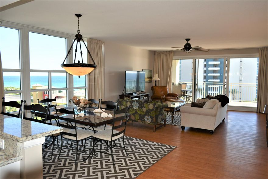 East End-Unit Condo with fantastic views of the Gulf, Beaches, Pools, Restaurants and Entertainment. You Must See this 3 Bedroom 3 Bathroom 6th Floor End-Unit Condo with unique floor-to-ceiling Windows . This is a rental machine. It comes fully furnished and rental ready. The kitchen has Granite countertops with Stainless Steel Appliances. The Master Bedroom has a King-size bed, large ensuite bathroom with jacuzzi tub and a separate entrance onto your private Balcony. From your living room you can watch your 65'' TV, view the Gulf or walk out to an oversize 469 sqft Balcony to relax. The 3rd bedroom can be used as a lock-out and can be rented separately. It has two entrances, a King-size bed, a wet bar, large bathroom with a jacuzzi tub and a separate balcony. This condo is perfect as a