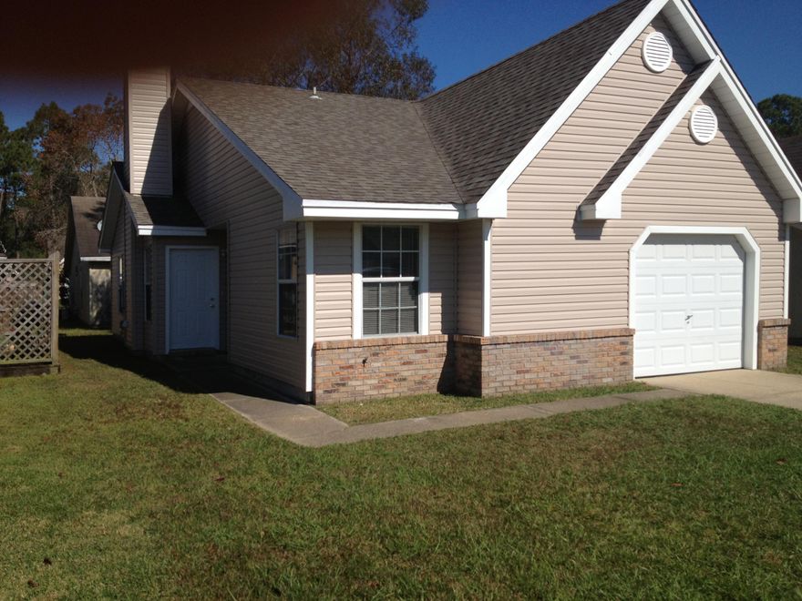 This home features vaulted ceilings and a fireplace, creating a warm and inviting living space. Updated flooring adds to the home's charm, while the kitchen offers plenty of cabinet space for storage. Conveniently located near schools, shopping, dining, and military bases. *All Coastal Realty Services residents are enrolled in the Resident Benefits Package (RBP) which includes renters insurance, HVAC air filter delivery (for applicable properties) and our best-in-class resident rewards program, and much more! More details upon application.*