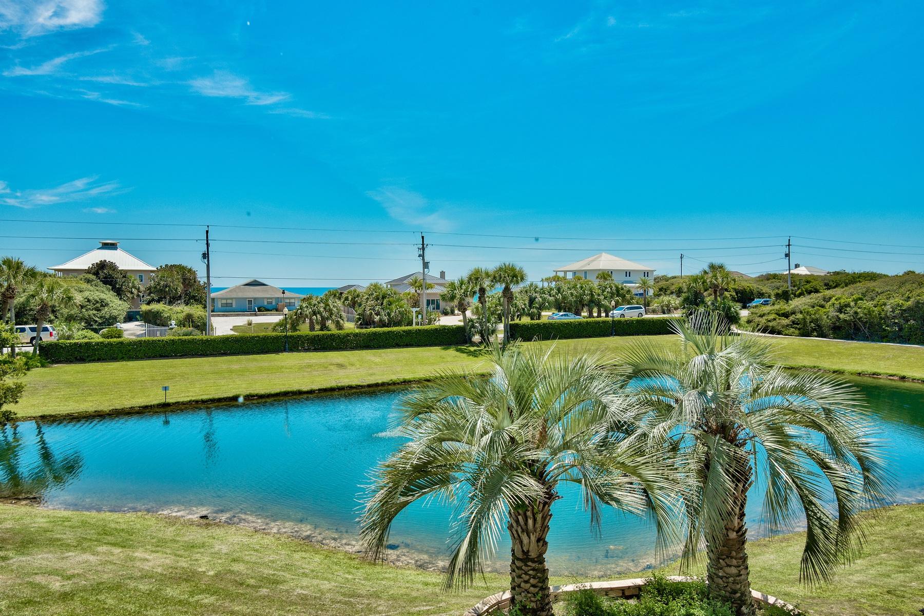 Secure your gulf view vacation condo and beach rental revenue stream with this charming 2nd floor condo. Generous balcony space overlooks attractive tropical landscaping, a community pond, and the emerald waters of the Gulf of Mexico. Across the street from the deeded beach access, this Gulf Place residence embraces an open space lifestyle where the living room, dining area, and kitchen flow seamlessly. Neutral Silestone countertops accent white cupboards with brushed nickel knobs and new stainless steel appliances. Two bedrooms include a master with its own bath, a guest bunk room and hall way bunks. A stackable washer/dryer unit offers in-home convenience.