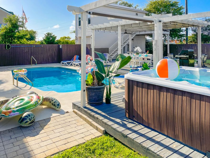 Welcome to Seas The Moment, your opportunity to own a high-performing vacation rental and unforgettable beach retreat in Destin's sought-after Crystal Beach neighborhood. Just a half-mile from the sugar-white sands of the Gulf, this stunning property brings in over $230,000 in annual rental income--and offers everything today's travelers (and owners) are dreaming of.Set on a rare lot and a half, the estate comfortably hosts up to 14 guests and 8 vehicles, with a 4-bedroom main home and two separate carriage house studios--perfect for multi-generational stays or maximizing rental flexibility. Whether you're entertaining family, hosting friends, or welcoming guests, this home delivers. Outdoors, unwind in your private backyard oasis with a sparkling pool, hot tub, and firepit, all surrounded by lush landscaping that invites relaxation and connection.

Inside, the home blends laid-back coastal charm with modern comfortopen-concept living, sunlit interiors, and thoughtfully designed spaces that welcome rest after a day at the beach. The carriage house suites offer added privacy for guests or owners who want a personal retreat.

Located just minutes from Camille's, Destin Commons, and local hot spots, Seas The Moment offers not just a homebut a lifestyle and an income stream in one.

Don't miss your chance to own one of Destin's most iconic rental properties. Live it, love it, or let it pay for itself.

Seize the momentthis one won't last.
