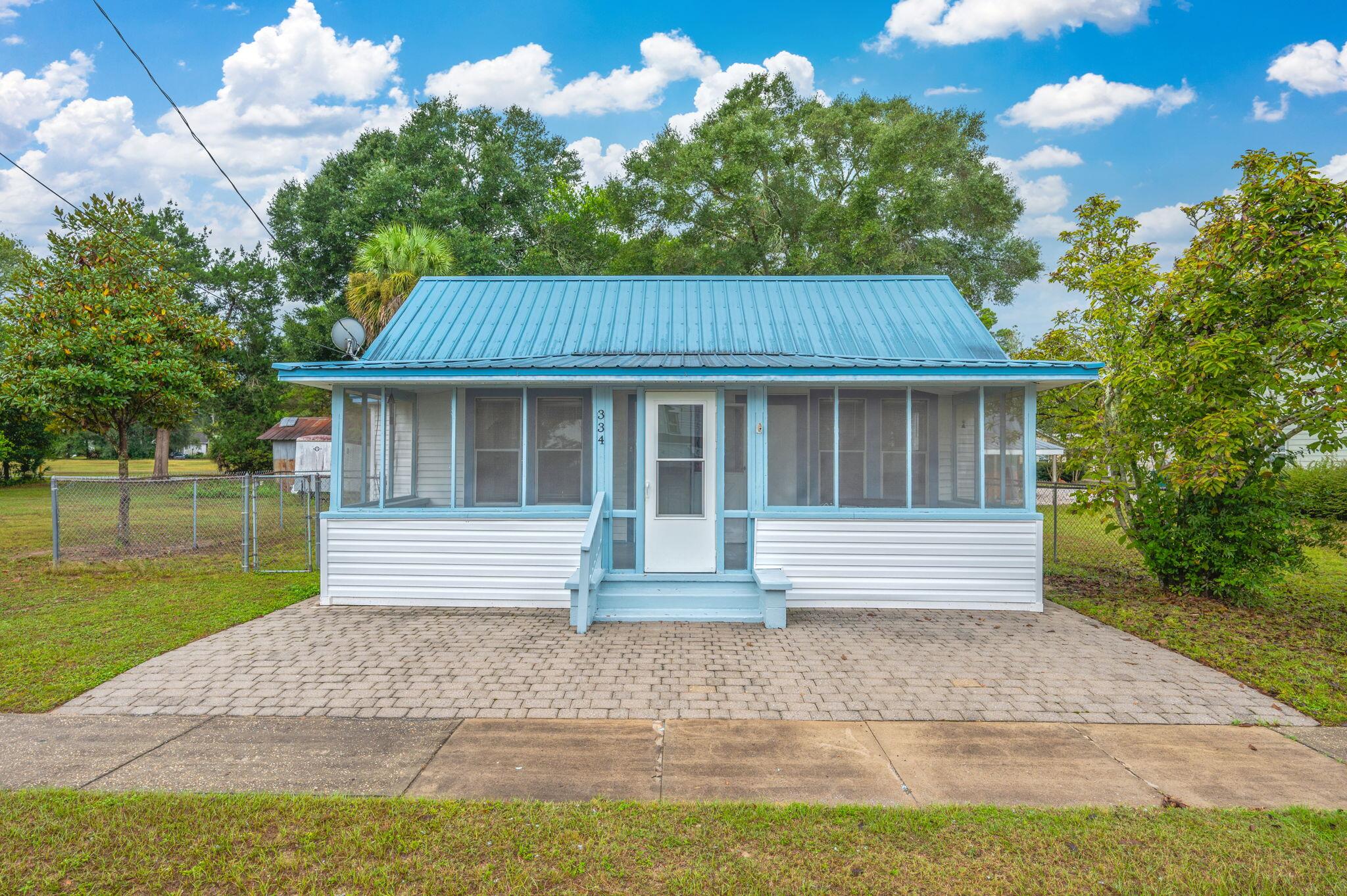 Charming 2 bedroom, 1.5 bath home for rent just one block from the beautiful DeFuniak Springs lake yard. This home features a cozy layout with plenty of natural light, an inviting living area, and a functional kitchen. Enjoy being within walking distance to the lake yard, perfect for morning walks, outdoor activities, and community events. Conveniently located near shopping, dining, and schools, this home offers both comfort and convenience in a desirable location.