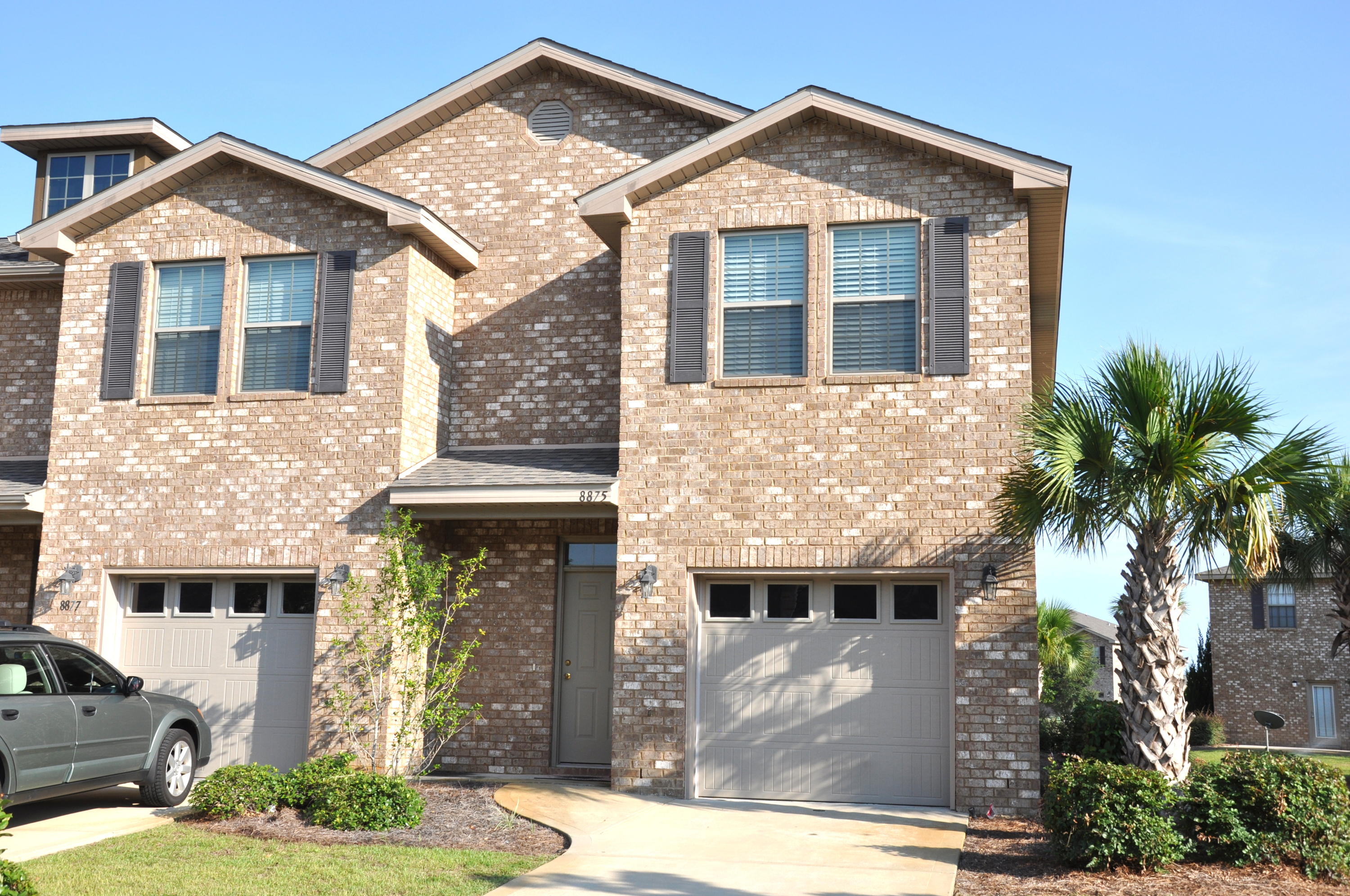 MOVE IN READY!! This all brick 3 bedrooms, 2 1/2 bathrooms, 2 story corner unit townhome with attached garage has tile throughout the first floor, kitchen with granite counters, maple cabinets and stainless steel appliances. Master bedroom and additional bedrooms upstairs along with laundry and guest bathroom. This classic charmer is located in a highly desirable neighborhood and minutes away from the beach. Come and see how lovely the neighborhood is!