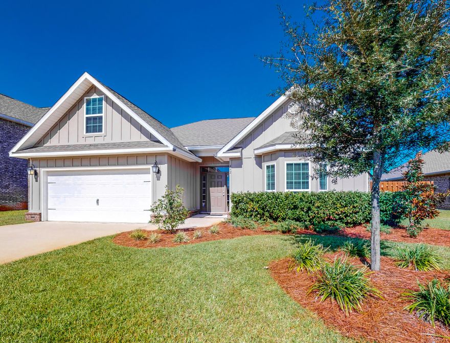 This gorgeous 2 year old home is just across the street from one of Hammock Bay's many parks. The expansive master bedroom with it's tray ceiling, has a large sitting area and beautiful spa like bath with a tile shower and granite countertops. In addition to the two other bedrooms, there is a flex room over the garage with it's own closet and access to a large storage area. The living room also features a tray ceiling and opens to the chef's kitchen and dining area. The newly added backsplash sparkles as do the stainless appliances, brushed nickel fixtures, and granite countertops. The dining area adjoins the large Florida room with it's views out to the back patio and the huge fully fenced and irrigated backyard. Plenty of room for an outdoor kitchen, pool, spa, gardens or all the above! The Florida Room also accesses the Master bedroom. The entire home is painted in a light bright grey with white trim, extensive crown molding and hardwood floors in all the common areas of the home. The paint and flooring reflects the best in current decorating trends! 3 sides of the home are brick clad, and the home has it's own private well and irrigation system for the entire lot. The backyard is privacy fenced with oversize gates for access. There is a gas stub for the grill and stove while the current stove is electric,and the water heater is gas. This is a gorgeous, impeccably maintained home in Hammock Bay's Central Park neighborhood. Hammock Bay is an unparalleled development with hiking trails, ponds, woods and spectacular amenities. Walton County is the 6th fastest growing county in the US and the fastest growing county in Florida. This is the time to chart your future in this wonderful home!