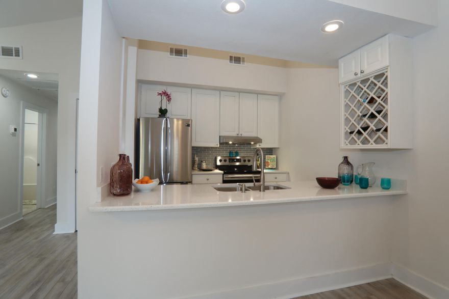 Fully updated, move in ready 2 bedroom, 2 bath townhome right in the heart of Destin! Gorgeous open floor plan with fenced in Large patio deck. Large corner lot with plenty of space for those looking for a generous yard. Updates include brand new metal roof, new AC, new granite countertops, new stainless steel appliances, new fans and light fixtures, brand new floors, new paint inside and out, new washer and dryer, new kitchen and bath faucets and new blinds! Co-agent has interest in the property.