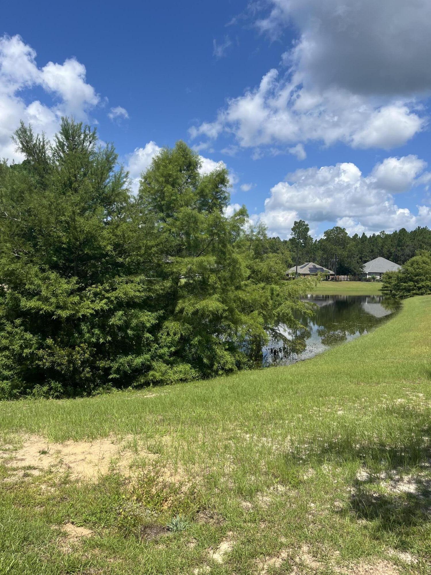 Let's build the home of your dreams! Premium Waterfront homesite...Incredible value! 65 feet on the lake! The CDD fee has been paid saving approx $10K to the buyer. Great view and level lot. Any builder is welcome. I can assist you in choosing one that will work for you. Enjoy the wonderful amenities Hammock Bay has to offer: clubhouse w/theater, fitness ctr, 3 pools, tennis, basketball, pickle ball, sports complex Bayfront park, sidewalks, walking trails and so much more. Hammock Bay is in a Community Dev District. HOA fee is $392.04 per quarter and a .5% Maintenance fee is due at closing.