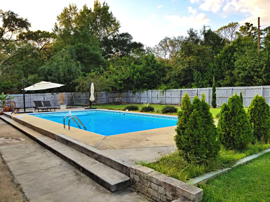 Welcome home to your own private Oasis! This home is perfect for entertaining with your own private SALTWATER POOL plus spacious living room with real wood fireplace and recessed lighting all situated on almost half acre lot! Oversized Master suite complete with double vanities, his & her closets, and sliding glass door that leads to the pool! This Shalimar pool home is strategically located near Eglin AFB, shopping, banking, dining, golfing, and A+ Schools! Seller paying up to 4% of purchase price for seller concessions. Call to schedule your private showing today!