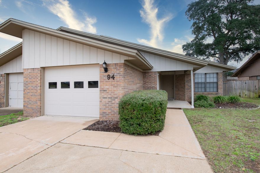 One story patio home with new shiny with kitchen appliances. Bedrooms are carpeted, have walk-in closets, and the middle bedroom features a skylight. While the master bedroom allows access to the back covered patio via a French door, the bathroom has a single shower and vanity, with a roomy dressing area. The entryway and all wet areas have ceramic tile, and most rooms have ceiling fans. There's a single car garage with pegboards for hanging your tools, and a pull-down staircase for storage. The townhouse is in a cozy neighborhood, off the main drag. Close to Eglin AFB's West gate. Within walking distance to Shalimar elementary, and in Choctaw High School zoning. Also, it's a short drive to several shopping centers, making it perfect for a new family!