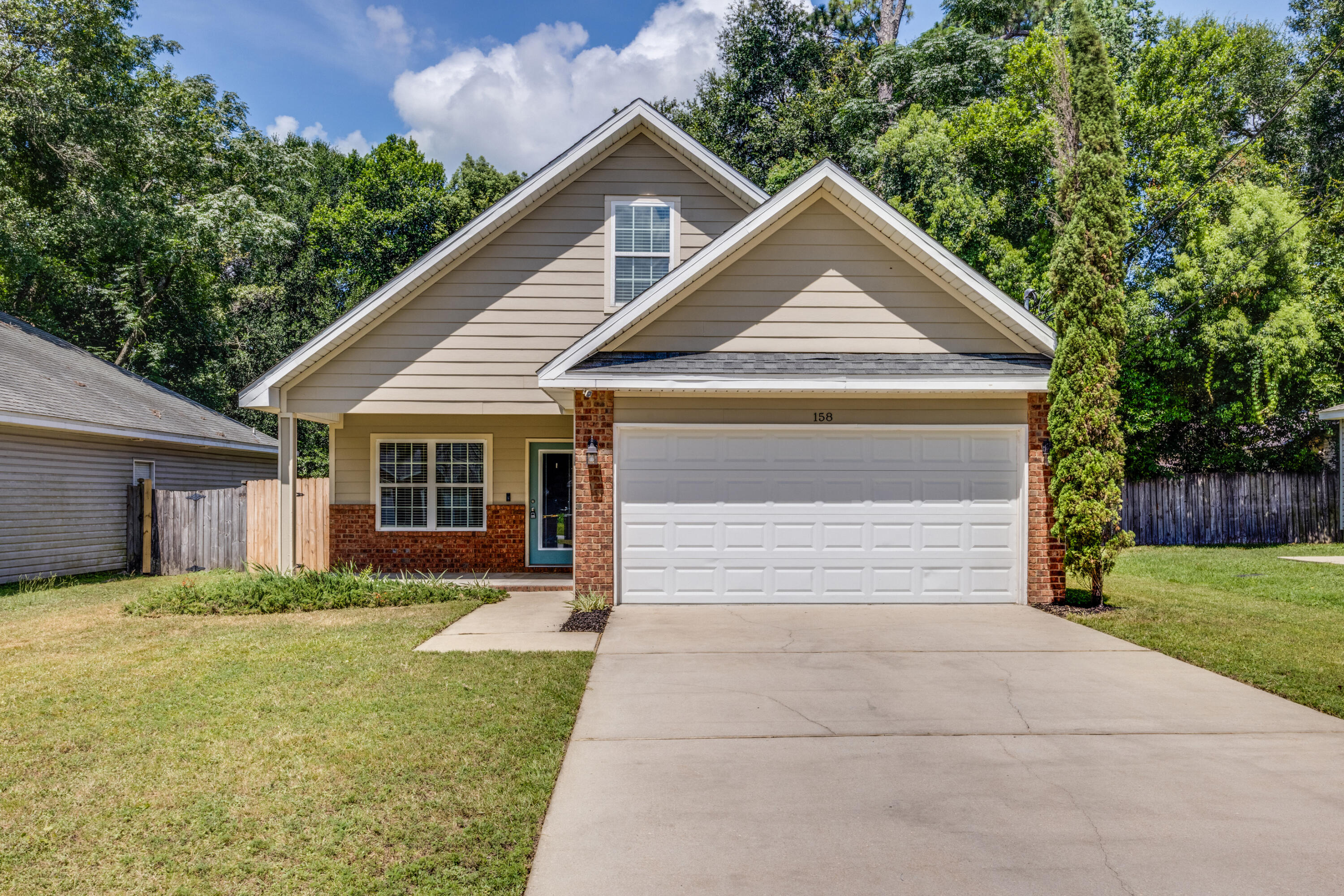 Take a step into this wonderful 4 bed/2 bath, two story home built in 2016 to see all it has to offer!! Located in central Crestview, everything is just minutes away! This home has SOLAR PANELS that were installed in 2022, the sellers will PAY OFF the balance at closing so the new buyers get to enjoy the solar panels fully debt and payment free!! Upon entering in the front door you will see the large open living area flowing right into the kitchen. Hard surface counter tops, along with matching appliances, beautiful dark stained cabinetry, a large pantry for all your food and canned storage. The home has brand new LVP flooring all throughout the bedrooms and main areas, along with all new paint throughout! Boasting a very large master bedroom with a beautiful double vanity in the master bathroom with a huge walk in closet! This floor plan has 3 bedrooms (including the master) downstairs, and the extra bedroom up on the second floor. The garage has built in shelves that will convey with the home as well as a fenced in back yard. Come and check out this amazing home that's ready for its new owners to take over and make their very own today!!