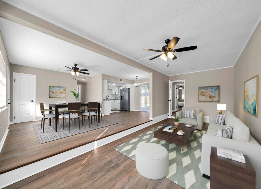 Back On Market at no fault of seller__Location, Location, Location.  This home has been completely remodeled.  Interior and exterior paint.  All new kitchen, Cabinets, Stainless Steel Appliances, sink, fixtures, and lighting.  New bathrooms with tiles showers, sinks, cabinets, mirrors, lighting, and fixtures.  New lighting with ceiling fans throughout, new laminate hardwood flooring in living areas, and carpeting in bedrooms.  Inside Utility Room.  New HWH, New HVAC, new roof.  Two master bedrooms,  One on one side4 of the home and one on the other side.  All new fencing in the backyard.