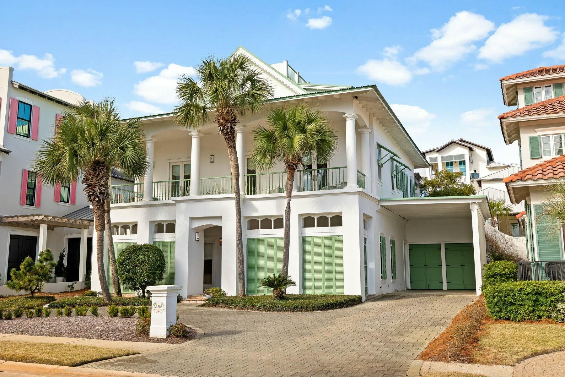 Meticulously maintained and thoughtfully updated, this home blends timeless craftsmanship with modern upgrades. A newly remodeled kitchen in 2023 sets the stage for effortless entertaining, while new fiberglass doors throughout the home in 2013, a new metal roof in 2010, and Azek decks added in 2011 ensure lasting durability. The widow's walk rebuild in 2025, and all-new shutters on the south facade in 2023 add both charm and resilience. Recent system upgrades include new exterior AC condensers in 2022, a new electrical panel in 2025 bringing the home up to current code, and new Carrier 14 SEER furnaces and AC in 2010. A bunk room addition in 2016 maximizes space, while exterior enhancements like a new lighting system in 2016 and rebuilt exterior stairs in 2013 elevate both form and function. Even the carport was covered with a metal roof in 2010, designed with practicality in mind.
As the first spec home in Caribe, this residence has deep roots in the community. Developed by Jim Adams, designed by renowned architect Tom Christ, and built by general contractor Ronnie Willis, it was constructed with unwavering integrity, "like a bomb shelter" as they put it. The 12-14 foot high utility room stands as a testament to its solid construction, weathering time and nature with ease. The home overlooks the neighborhood fountained lake and the private beach access boardwalk is located directly across from the home's front door on Rue Caribe, making it an easy walk to the beach. Nestled south of 98 in a gated community, this property is ideal as a primary home, second home or vacation rental. Caribe also has two community pools for its owners and guests. The property has never been rented, original owners, and no structural issues, just decades of care, thoughtful upgrades, and a home built to stand the test of time.