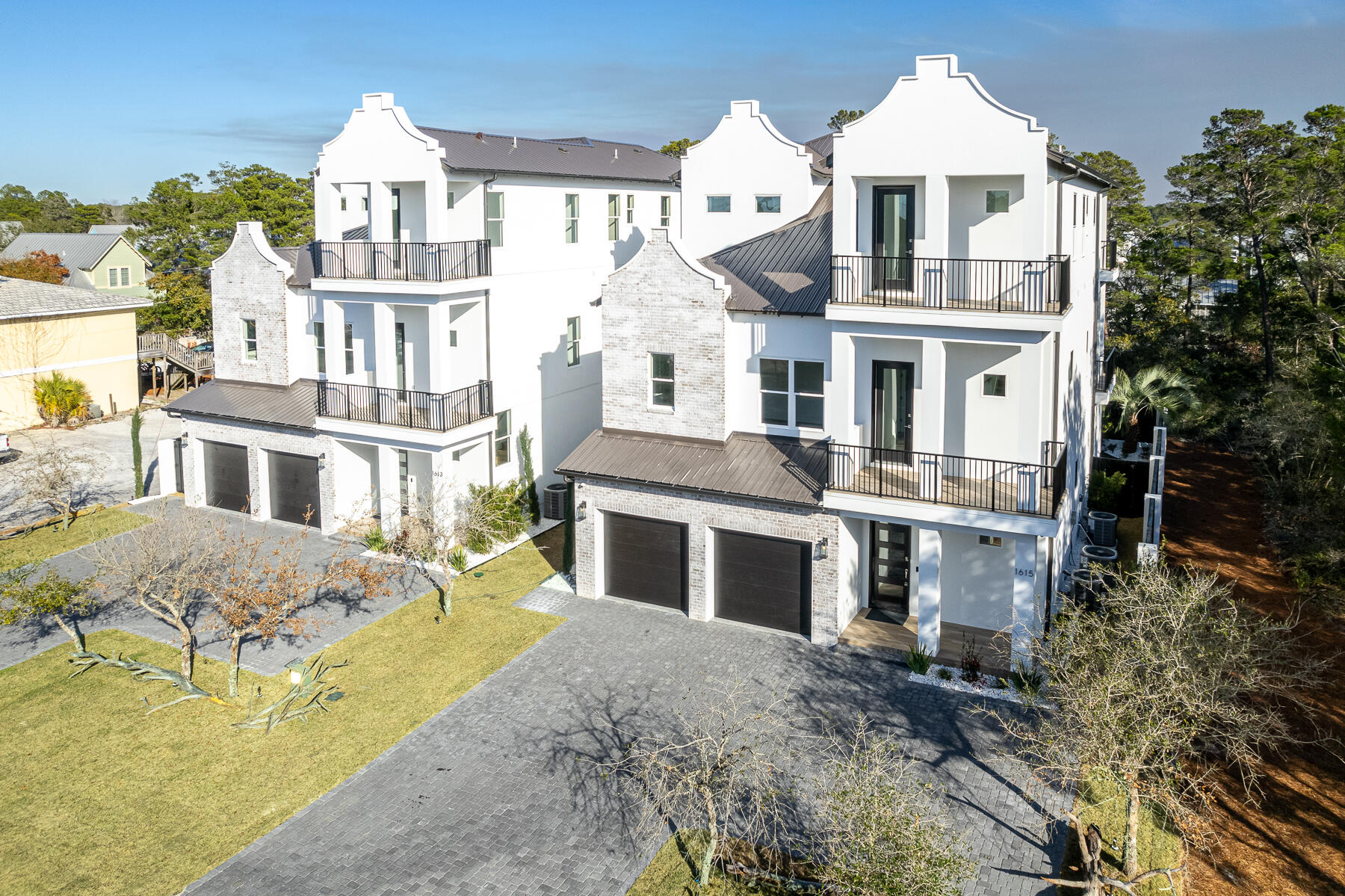 This extraordinary NEW Construction home is a lavish sanctuary mere steps from dining, shopping,and the beautiful white sand beaches. This opulent coastal masterpiece is 3768 sq ft. It has 5 bedrooms and 6.5 bathrooms w/master en-suite bath that has 6 ft tub and walk in shower and custom tile through out. Upon entering the home you will fall in love with the open concept living areas that merge with 6 large outdoor porches which offer Gulf views from elevated vantage points. Large first floor game room which opens to the pool area for extra indoor/outdoor feel. 2 Bunk Rooms 9 total bunks. Each floor has washer/dryer, wet bar, microwave drawer and small fridge.The kitchen/ dining area has a massive island that seats 14 and gorgeous lighting from Restoration hardware.