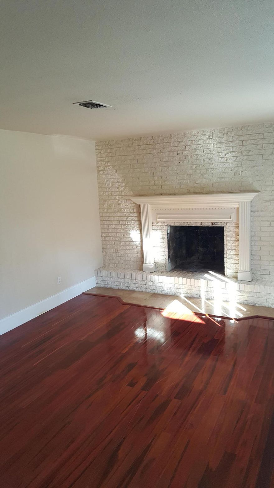 Large lot located beside a park and close to schools. Hard wood floors, stainless appliances, fireplace, new HVAC, has been rewired.