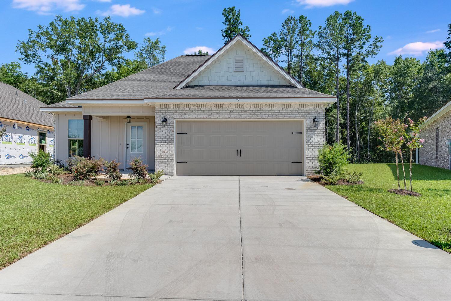 A lifestyle redefined by this exceptional brand new home with 4-bedroom, 2.5-bath rental home spanning 1980 sqft of accurate and open living space. Situated within the coveted master plan of Hammock Bay in South Walton, FL, this gem seamlessly combines modern living with comfort. The open floor plan accommodates your family's needs while a covered back porch and the yard strike the perfect balance between indoor and outdoor living, offering space for relaxation, entertainment, and cherished memories. Nestled in the tranquility of Freeport's landscapes, and not too far from Scenic Highway 30-A's pristine beaches and captivating emerald waters along the Gulf of Mexico. Step beyond your rental and explore the world of Hammock Bay's amenities.