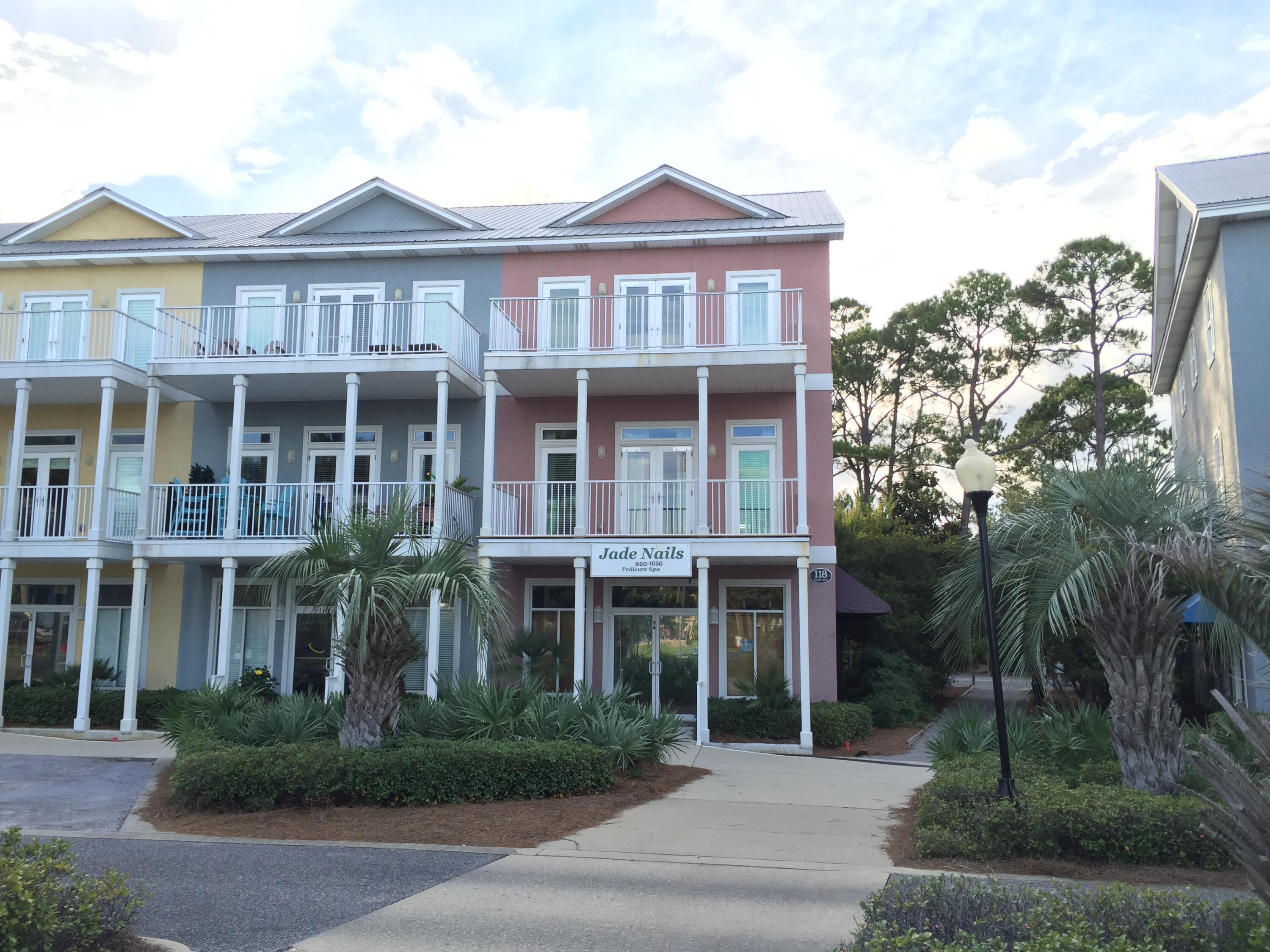 Beautiful townhouse in the much sought after Gulf Place development. Tons of shopping, restaurants, special events, and the beach all within a block; truly a unique community! Enter through the private rear facing entrance into a good sized bonus room. Climb the stairs to the second floor featuring a large living room, with 10' ceilings, and large balcony. Good sized kitchen with plenty of room, dining room, laundry room, bedroom and bathroom complete the second floor. On the third floor you'll find the spacious master bedroom, you'll find his and hers closets a second Gulf Place facing balcony, a private master bath with dual vanities and a garden tub. Two additional bedrooms and another bathroom complete the third floor!
