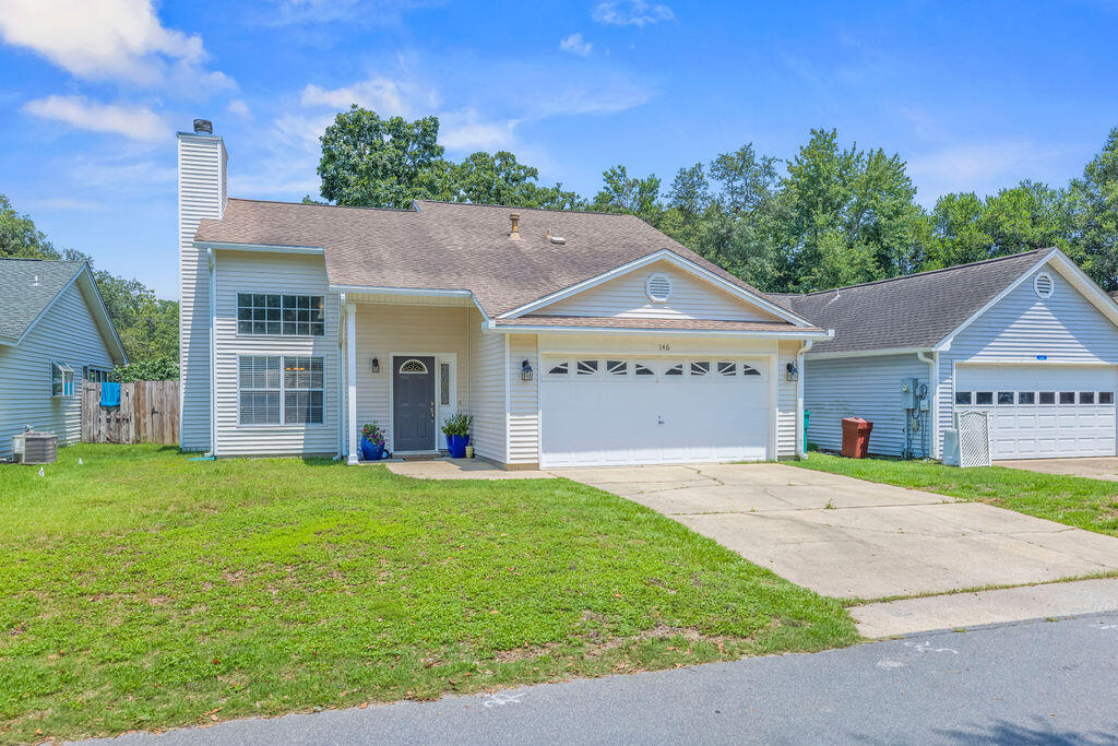 Here it is, the one you've been waiting for! LOCATION, LOCATION, LOCATION!!! This beautiful home is situated just 3 doors down from the community pool and picnic area, a short walk to Bluewater elementary school, a hop skip and a JUMP to shopping, Eglin AFB, and our jaw dropping beaches!? Currently, this is the ONLY active listing in Bluewater's desirable Blue Pine Village!! Step right in to the bright and beautiful wide open living space! This home features cathedral ceilings, gorgeous engineered wood floors, gas fireplace, kitchen area with SS appliances and so much more! The 1st floor master bedroom includes a large walk in closet and full master bath with dual vanities. The 2nd story includes a cozy reading loft area, 2 nice sized bedrooms, a full bath and an attic with plenty of storage space or possibly finish for another bedroom or office space? For a small additional fee, BPV offers a designated lot to store boats, trailers, campers, etc! Don't let this one slip away..HURRY before she's gone!