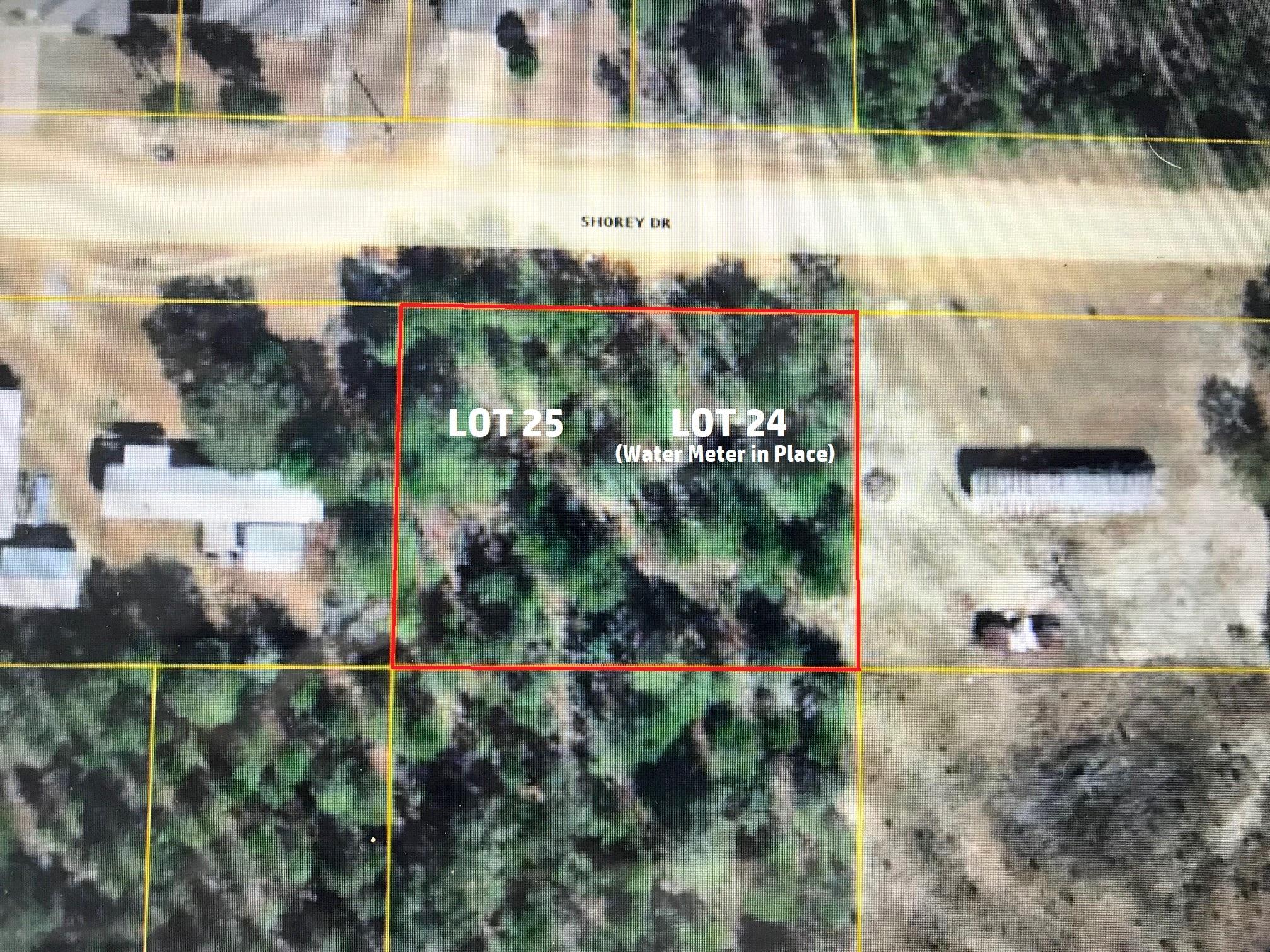 Great location for this .46 ac double lot in growing Mossy Head area of Defuniak Springs (Water Tap Paid & meter on site...$3,220 Value!!). Located minutes fromBlackstone Golf Course and I-10 for quick commute to Crestview, Niceville and Eglin AFB. There are two .23 ac lots (Lots 24 & 25), with water meter located on lot 24. Power on street; Septic tank would be required. This one won't last long!