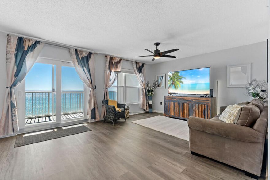 Documented RENTAL PROJECTION$62,000-$70,000!  Factor in the new leather granite kitchen countertops, new LVP flooring and top of the line black steel appliances and this prime 5th floor condo has the potential to be a rental machine. Not to mention the view, that takes your breath away, is visible from the moment you walk through the door! You'll enjoy relaxing on the expansive 27'X8'   private balcony overlooking the crystal blue waters of the Gulf of Mexico and the HUGE, seasonally heated, pool and courtyard. Islander has Gated Covered Parking for owners as well as Private Beach Access, a gym, meeting rooms, recreational areas. HOA Fees include: water, sewer, trash, pest control, cable, internet and landscaping. Come Experience Okaloosa Island at its finest in THIS Pristine Condo.