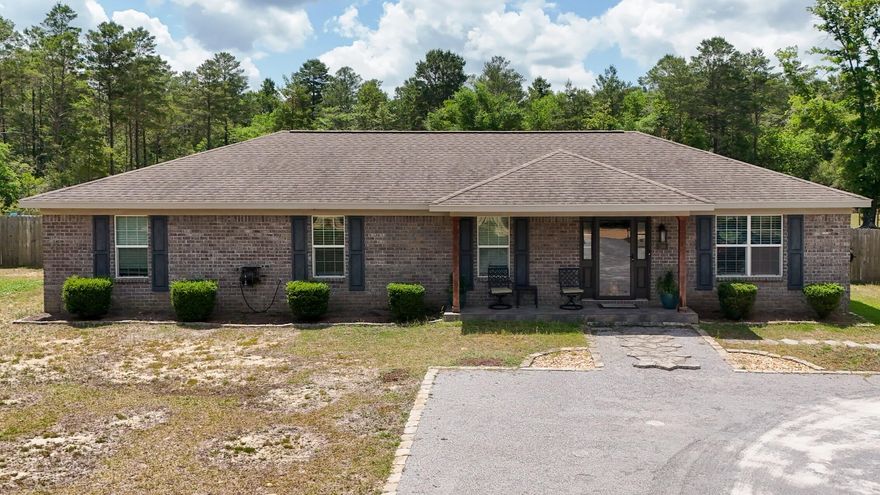Welcome to your dream home! This 4-bed, 2-bath brick residence, built in 2018, boasts over 1,700 square feet of living space, perfectly situated on an expansive 2.5-acre lot. The large backyard is fully fenced, making it an ideal playground for all. Enjoy outdoor entertaining on the generous deck that overlooks both the yard and the pool, perfect for summer gatherings and relaxation. The possibilities are endless here--with ample space to create your own garden or outdoor retreat.Approximately half of the parcel remains fully wooded, providing a serene backdrop and opportunities for recreational activities such as riding 4-wheelers. Experience the tranquility of country living while being just 15 minutes from the city, ensuring you have the perfect blend of peace and convenience.

Located a mere 25 miles from Eglin Air Force Base and close to the I-10 ramp, you'll enjoy easy access to all that the area has to offer. Additionally, the stunning sugar-white beaches are only a 45-minute drive away, making it a fantastic location for both relaxation and adventure.

Don't miss your chance to own this beautiful property that offers both a peaceful retreat and room to grow! Schedule a showing today and start envisioning your new lifestyle on this incredible 2.5-acre paradise.