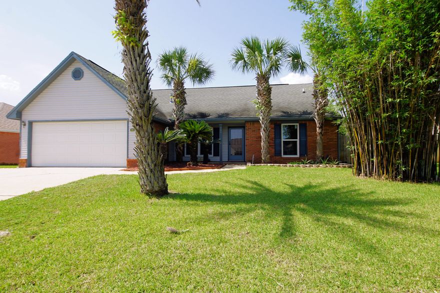 PARADISE FOUND! Pool Home in Desirable Emerald Pointe Subdivision with Deeded Beach Access on Santa Rosa Sound. Convenient to Hurlburt Field! New Windows and Entry Door Just Installed! Seller says HVAC and Water Heater approx 3 Yrs New. Covered Front Porch Leads Inside to Great Room with Cathedral Ceilings and Gas Fireplace. Dining Room with Big Picture Window. Kitchen with Granite Counters and a Breakfast Bar overlooking Tiled FL Room and Backyard. Gorgeous Gunite Pool and Spa, Fire Pit, Apple Tree, Persimmons, Figs and Beautiful Clumping Bamboo for Privacy- won't spread! Gas Line For Grilling. Year Round Fun! Main Living Areas are Tiled. Split Bedroom Plan. Master Suite with Hardwood Floors. Additional Bedrooms have Laminate Wood. HUGE Upstairs Bonus Room!Buyer to verify measurements.