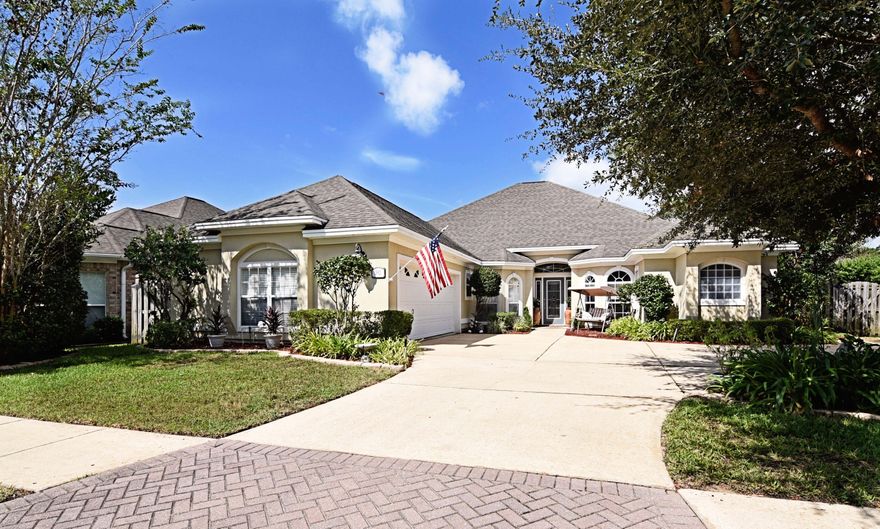 ABSOLUTELY STUNNING! This home is in move in condition and is beautiful. CUSTOM built,the attention to detail shows in features both small and large. The exterior features lush colorful landscaping around the circular driveway, adding to the pleasing curb appeal.The interior has been freshly painted and is open and airy. Gleaming HARDWOOD floors lend an elegant air to a very family friendly floor plan with the large family room and fireplace in the center of the home.To one side, you find the OFFICE and master bedroom suite. The bedroom is large and the bathroom area is gorgeous, with a large walk in shower featuring 2 shower heads and lovely tile along with a tub and double vanity. The other side of the home holds the other 3 bedrooms,plus a DEN that is currently being used as a nursery.