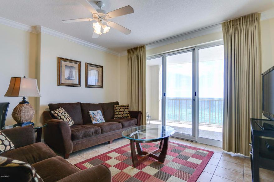 A rare find - This rental ready condo at Ocean Villa is a spacious, handsomely appointed 2 bedroom condo blessed with a Million Dollar View! Step right in to the high dollar summer rental season with many bookings already in place  this turn key property is ready for you all you need is your bathing suit! Once you soak in the stunningly panoramic Gulf vista on display from the curved and generously sized balcony of this 12th floor rental unit, you'll be fully ready to claim it as your own! Access to the enormous beachfront balcony can be had from both the living room and master bedroom - imagine waking up to the sounds of the surf and the view of the emerald green Gulf water!