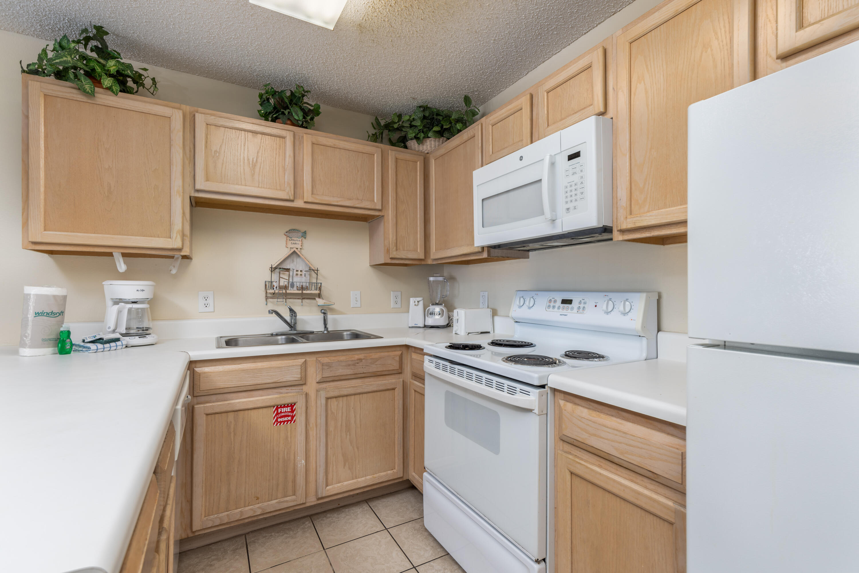 GRAND CARIBBEAN EAST CONDO UNIT 207 - Residential