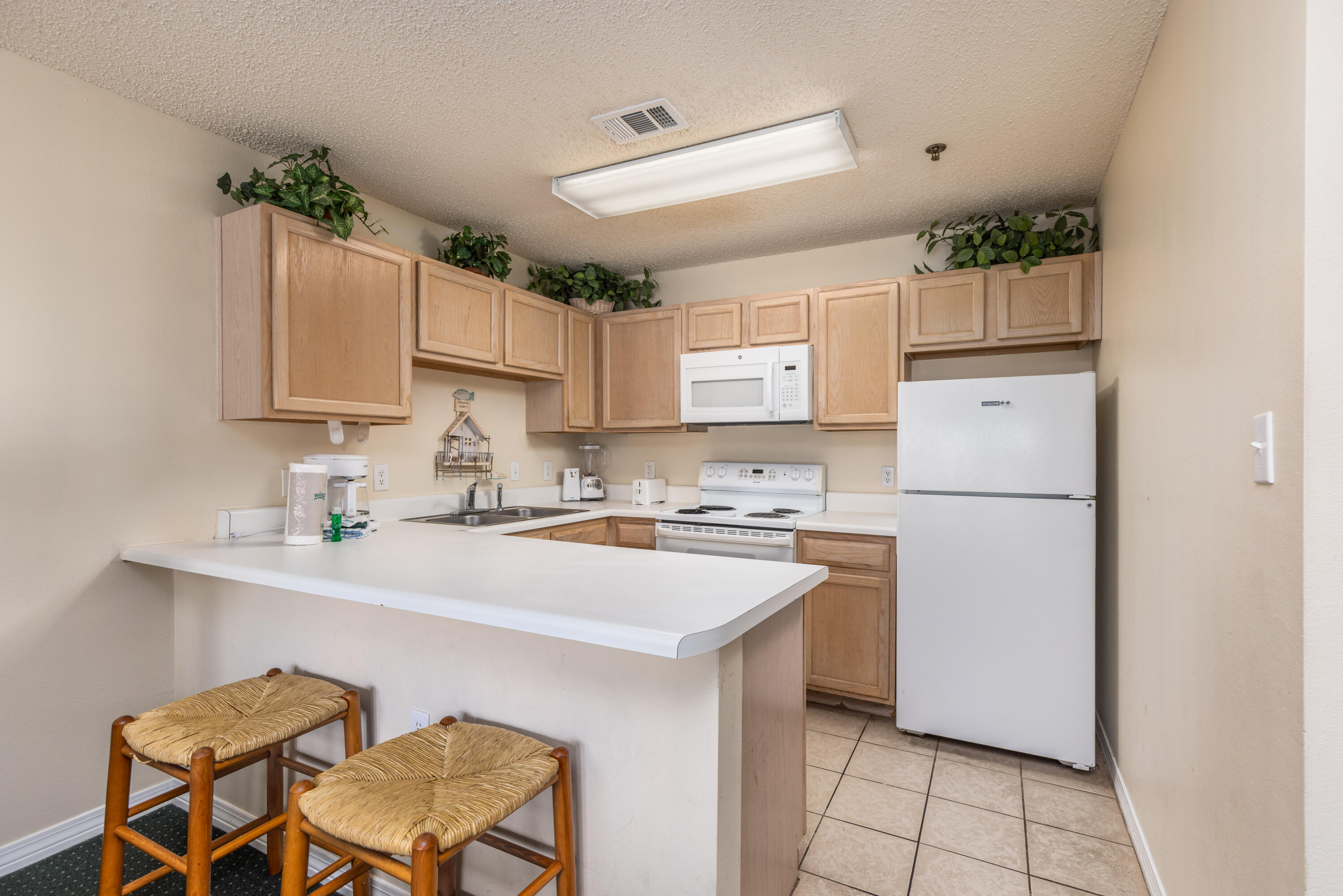 GRAND CARIBBEAN EAST CONDO UNIT 207 - Residential